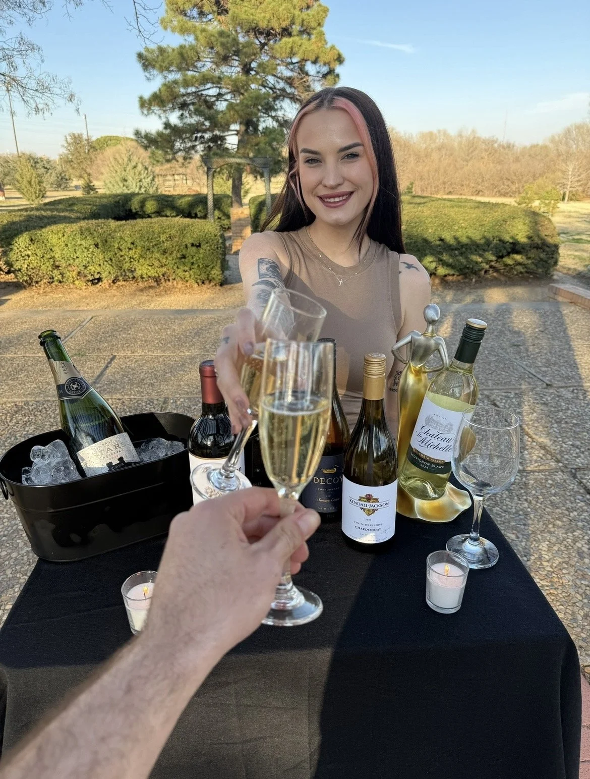 Katie cheers champagne.jpg