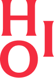 Close-up of red text spelling 'H O L' on a black background, with parts of the letters visible.