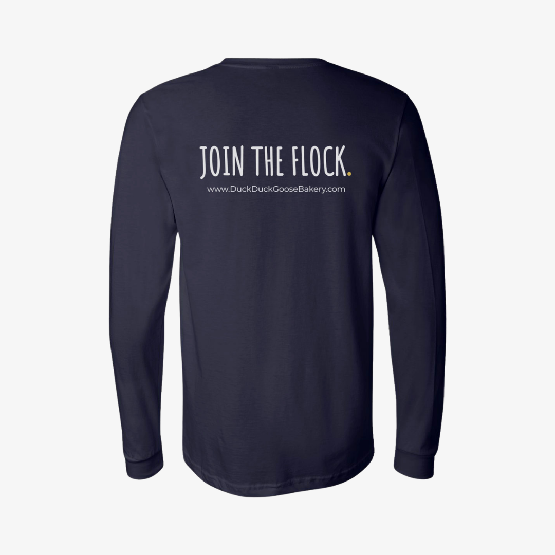 Long sleeve duck duck goose bakery merch with logo in middle of the navy blue shirt.