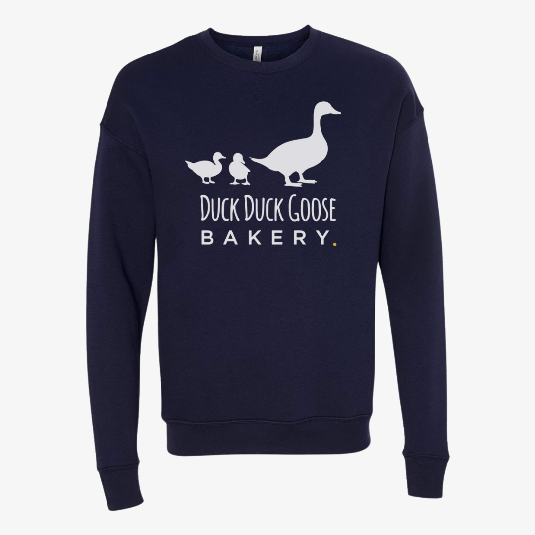 Duck Duck Goose Bakery crewneck with the duck logo in the middle.