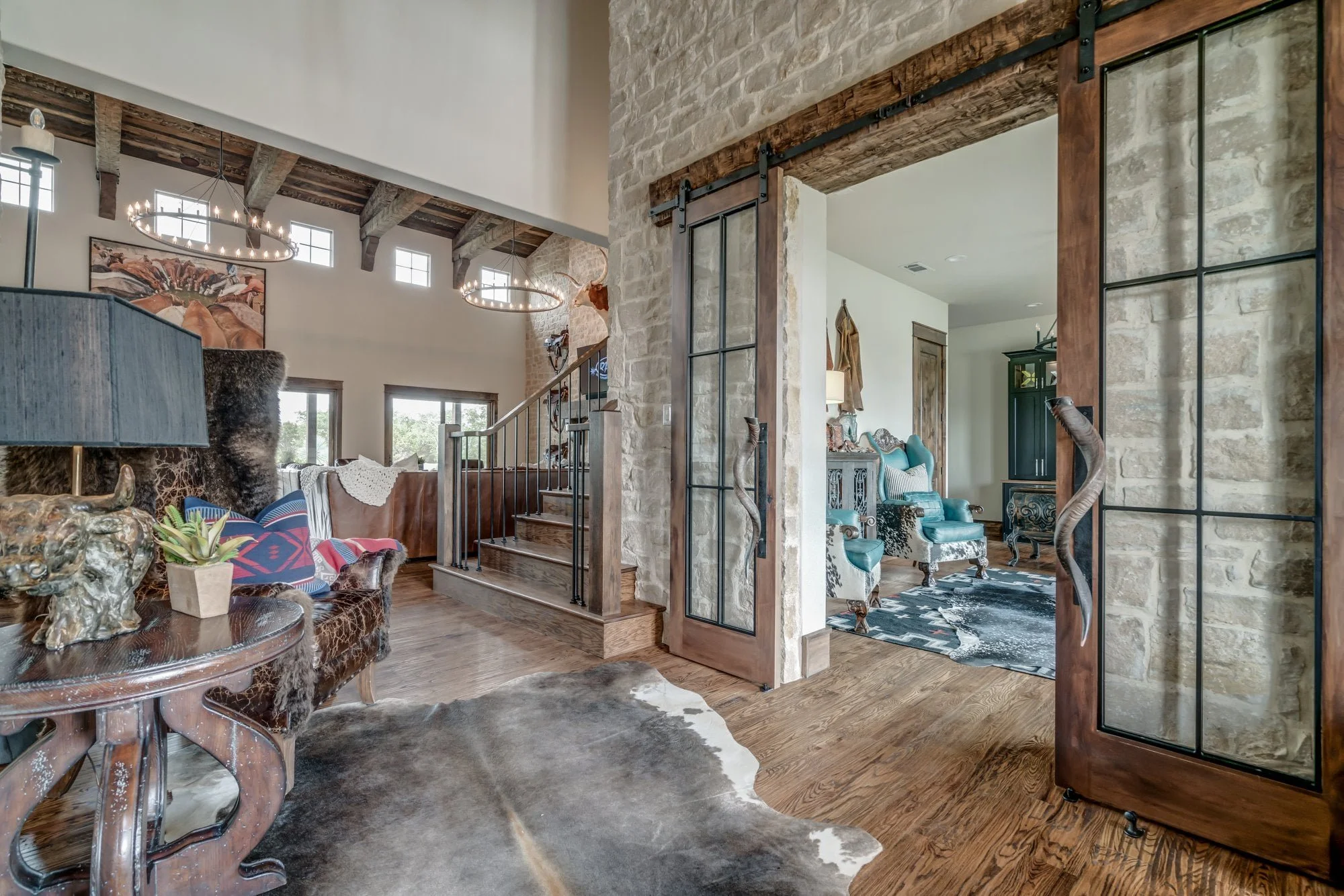 Western ranch style custom home in Weatherford Texas with stone exterior and large porch