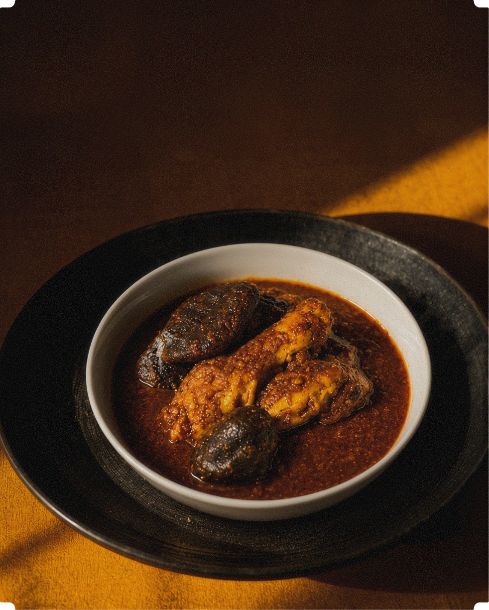 Ayam buah keluak is a traditional Peranakan dish consisting of chicken, tamarind gravy and buah keluak nuts