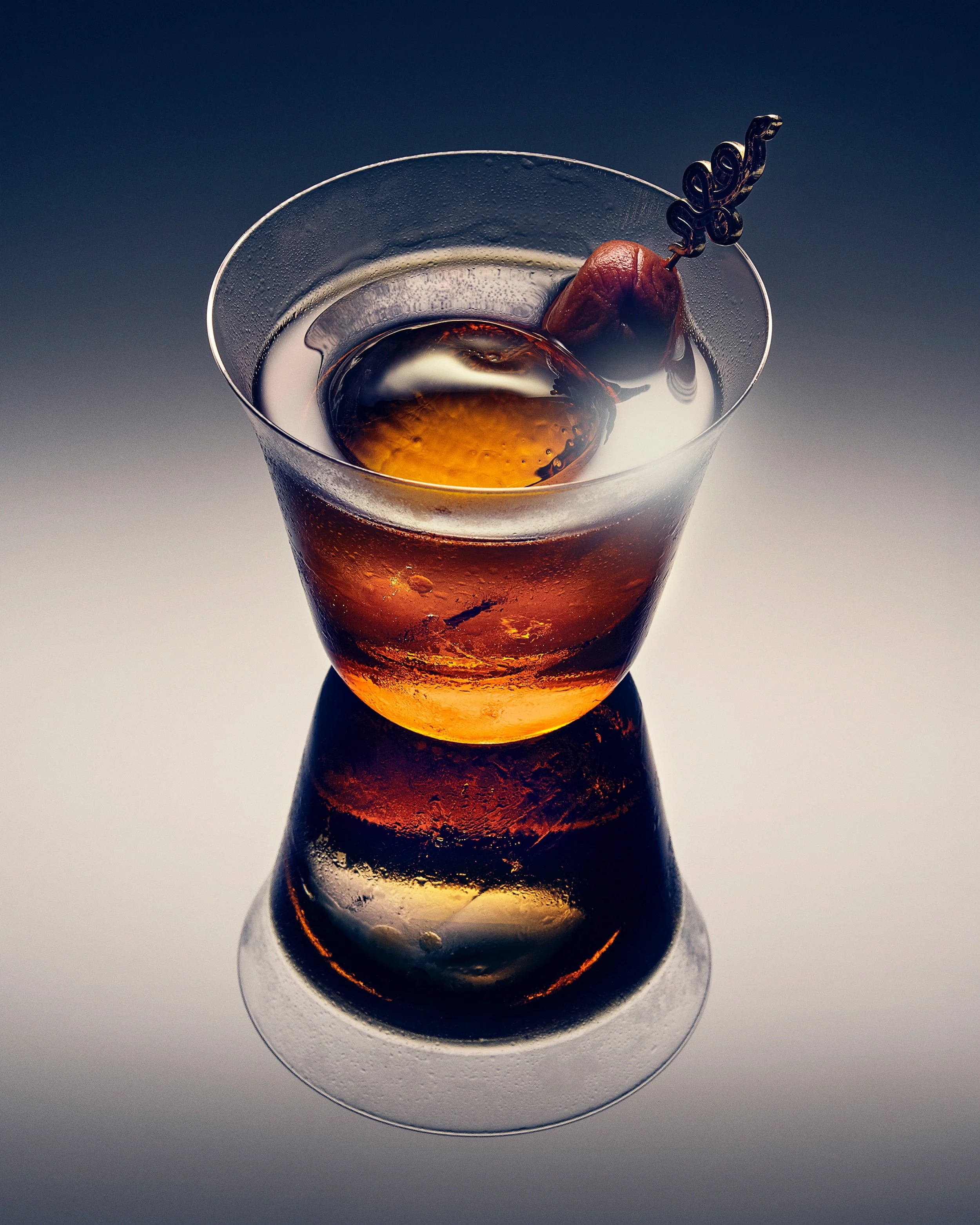 BITTERSWEET, DEEPENED.

Orientalist Imperial Rum brings warmth and depth. Umeshu lends ripe plum.

Marendry Bitter Amarena Fabbri folds sour cherry into the bitter line. Cynar draws it earthward. Sweet vermouth binds the edges.

Dark fruit. Burnished