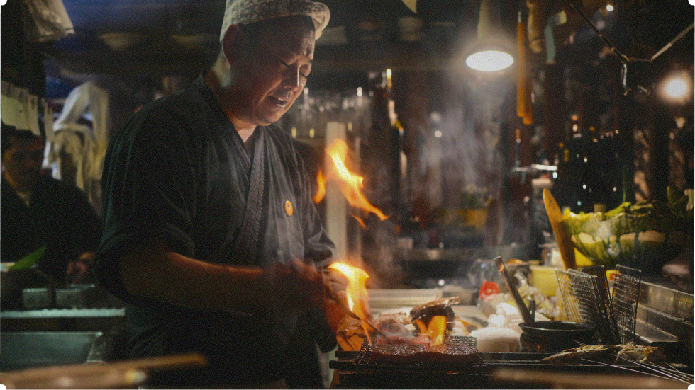 Yakitori smoke, cold beer and ramen steam define the quieter rhythm of the city after midnight