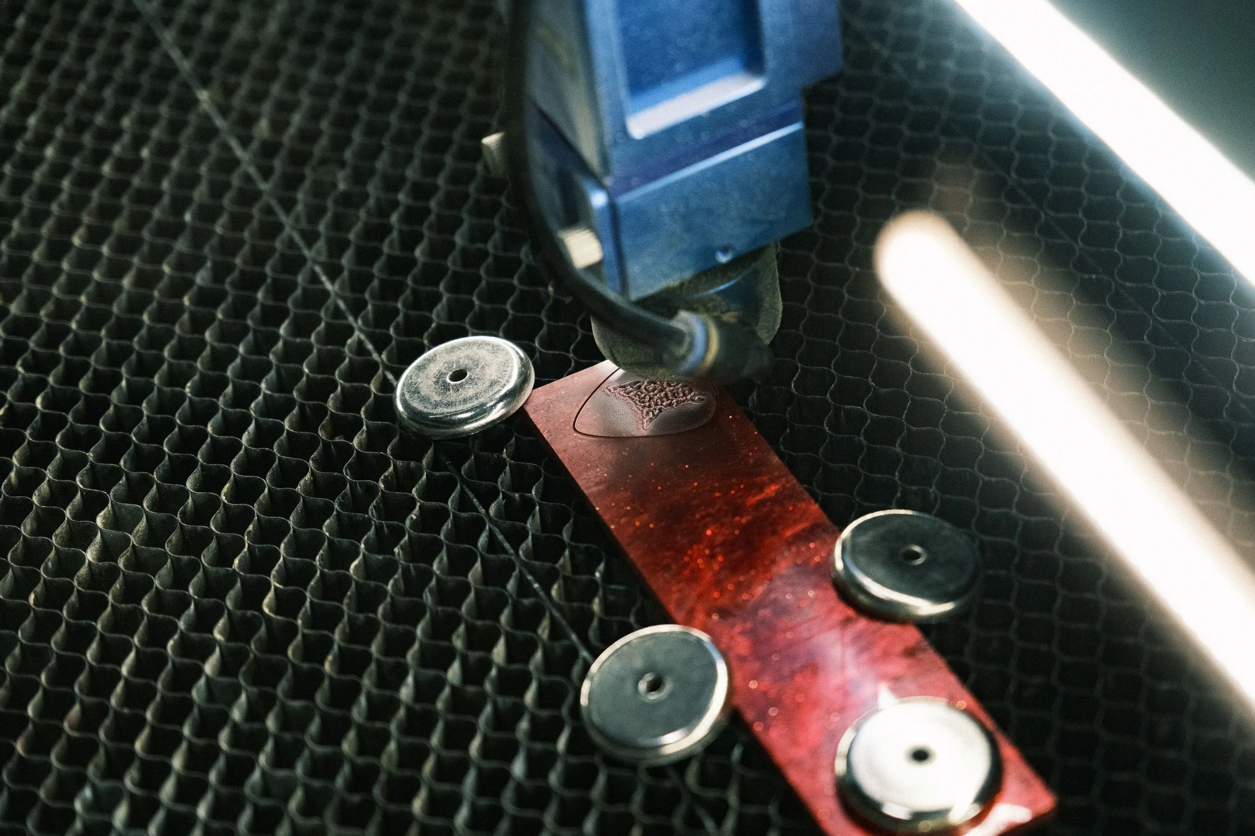   …and the logo and the pick shape taking form.  