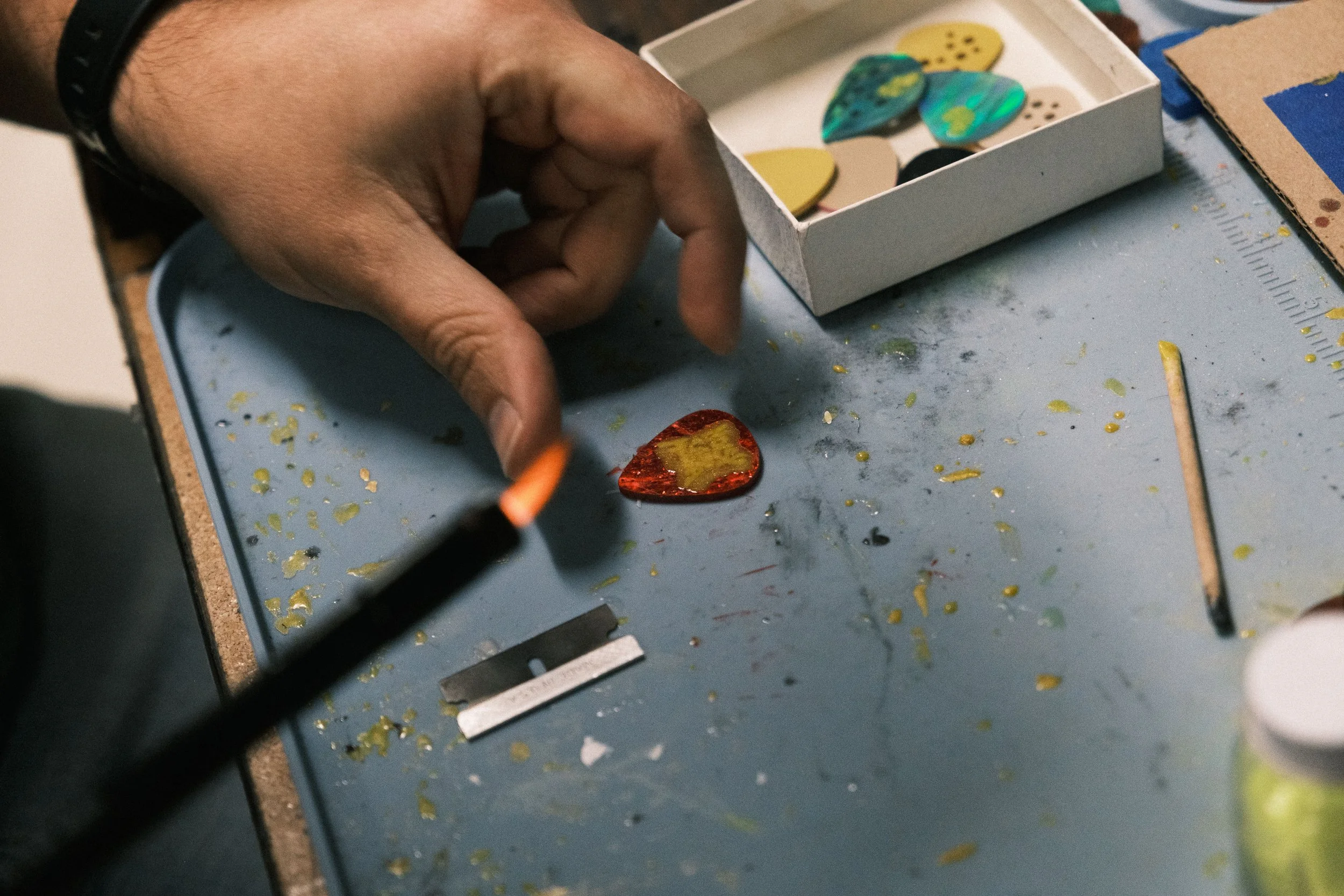  Afterwards, a butane lighter is used to lightly heat the resin, removing any small bubbles.  