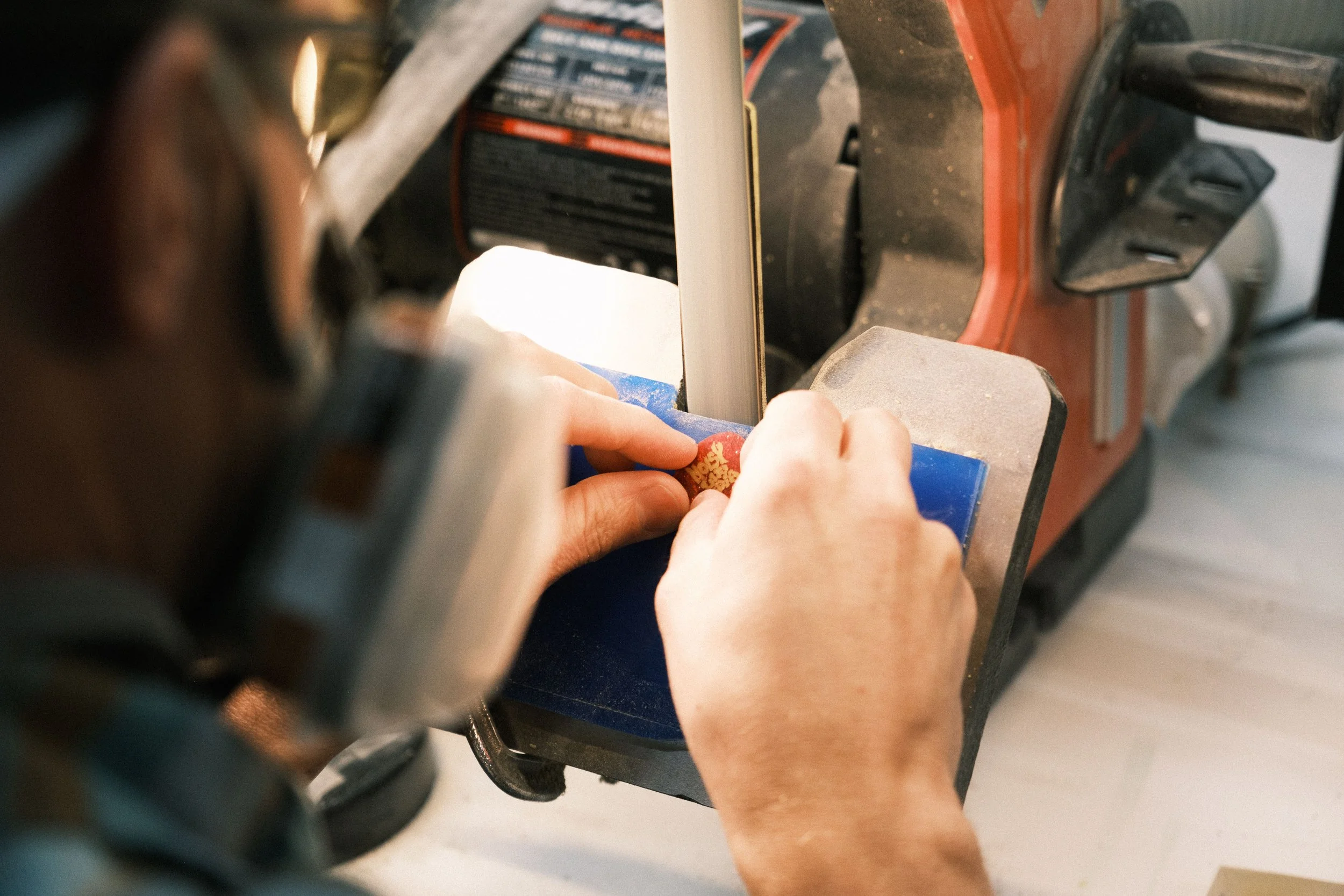   Rick then takes to a smaller belt sander and carefully shapes and sands the edges.  