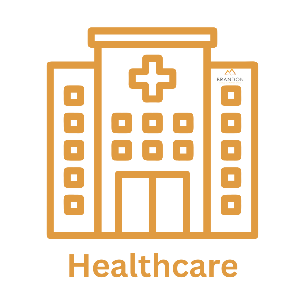 Outline of a hospital building with a cross symbol on it and the word 'Healthcare' below.