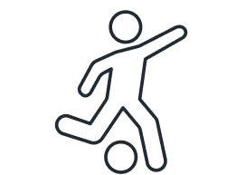 Line drawing of a person kicking a soccer ball