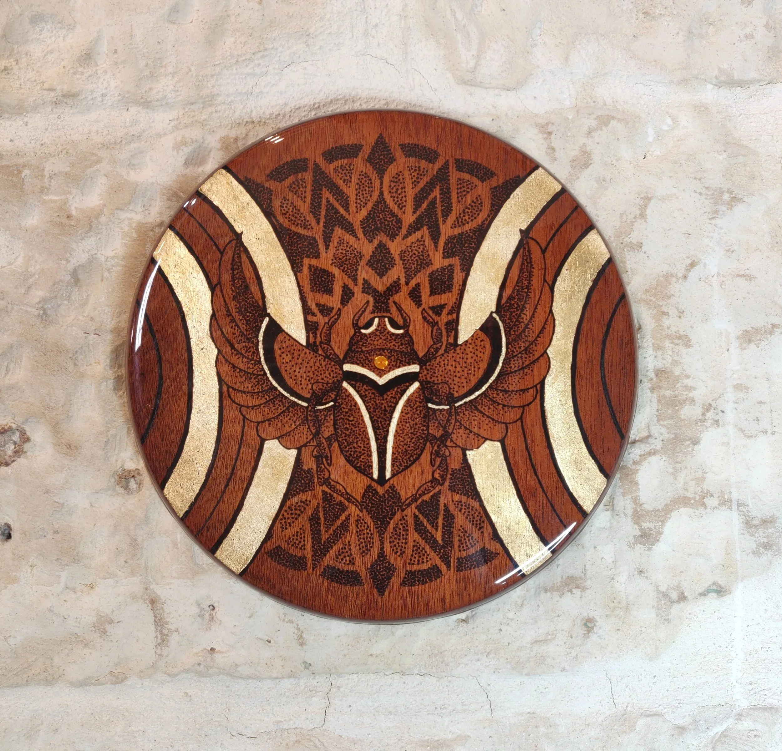 The Gold Scarab

Size  24cm 
Pyrography, Gold leaf and finished in gloss resin