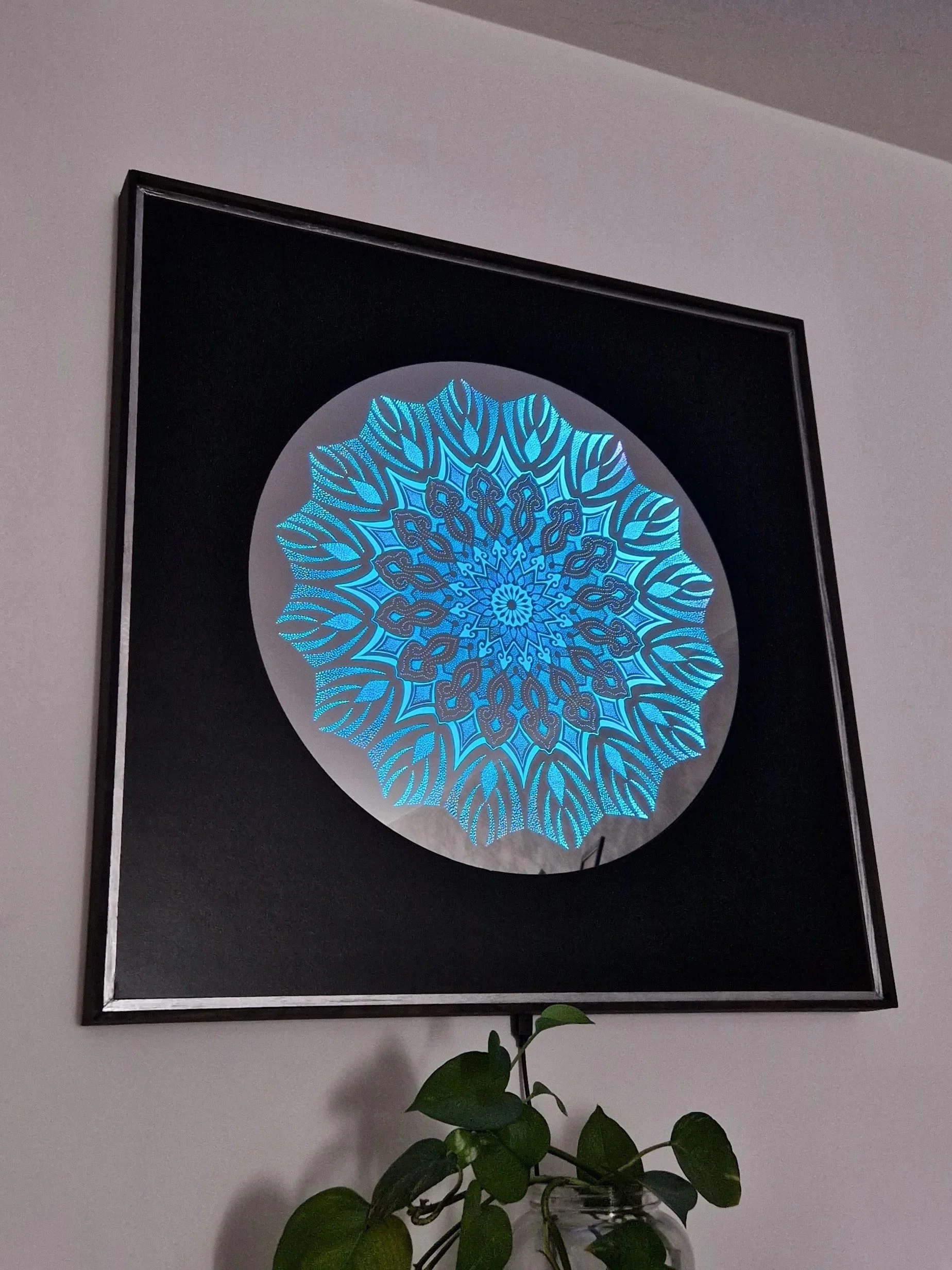 A MANDALA OF STILLNESS . This handcrafted engraved mirror combines intricate mandala with a soft LED illumination, creating a contemporary statement piece that radiates balance, depth, and tranquility.