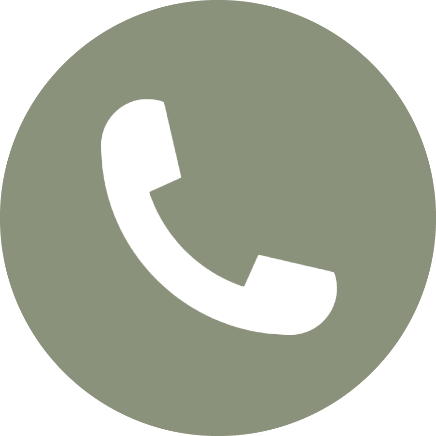 Green circular icon with a white telephone handset symbol in the center.