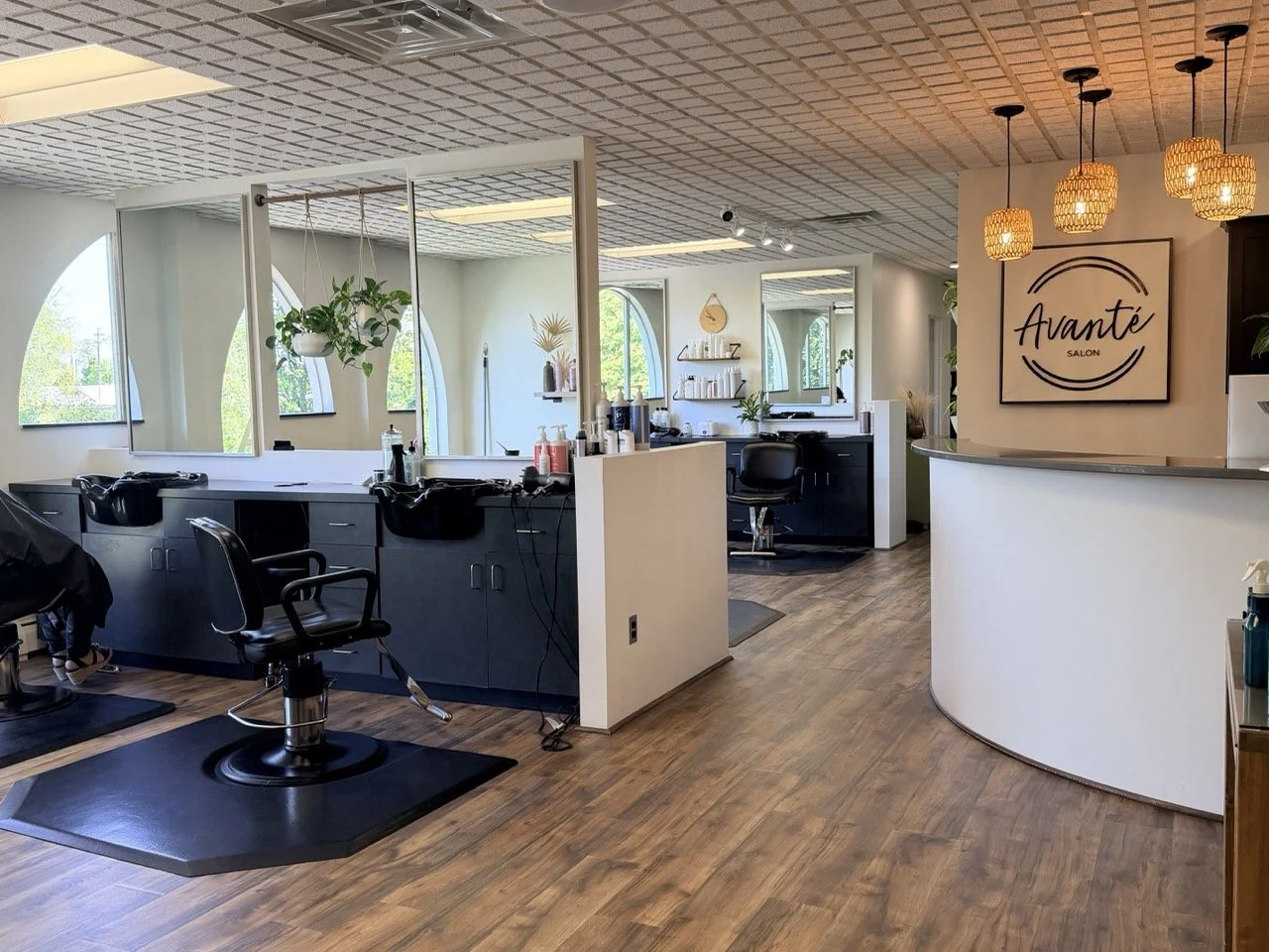 Bright, welcoming salon interior with modern styling stations.