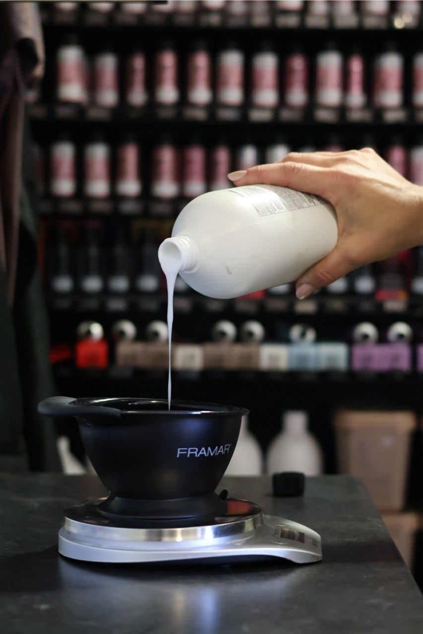 developer bottles pouring hair color