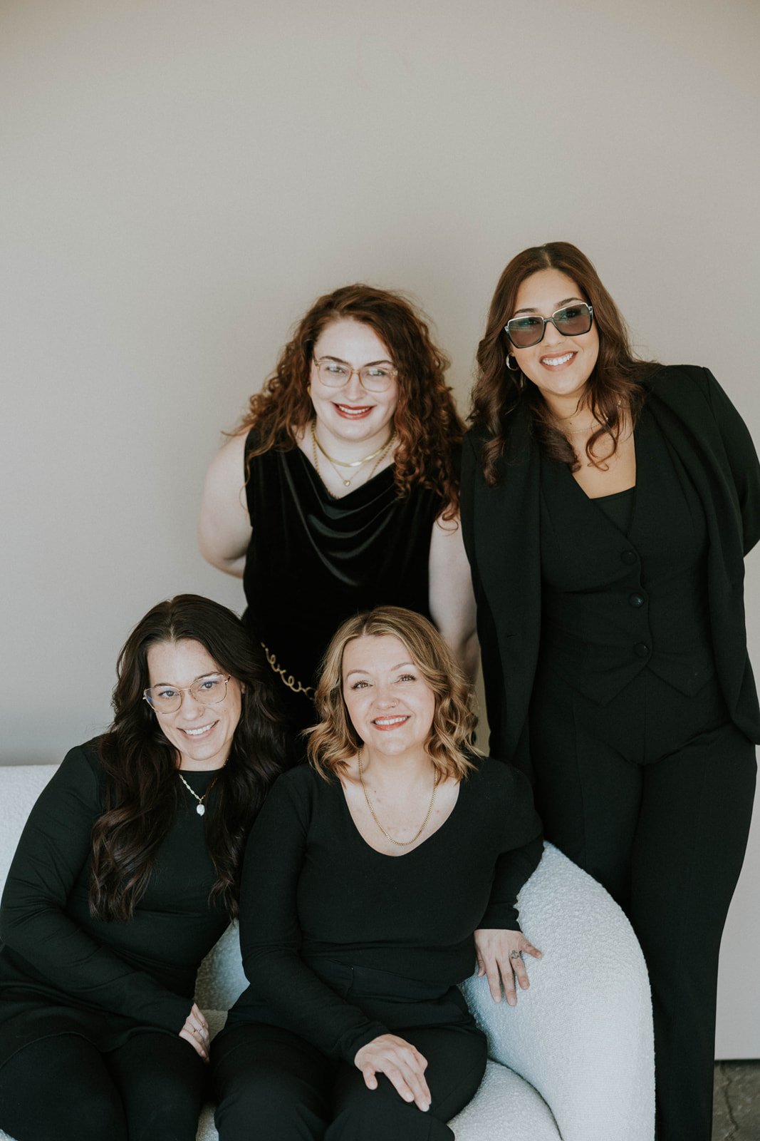 group shot of the All Things New stylist team