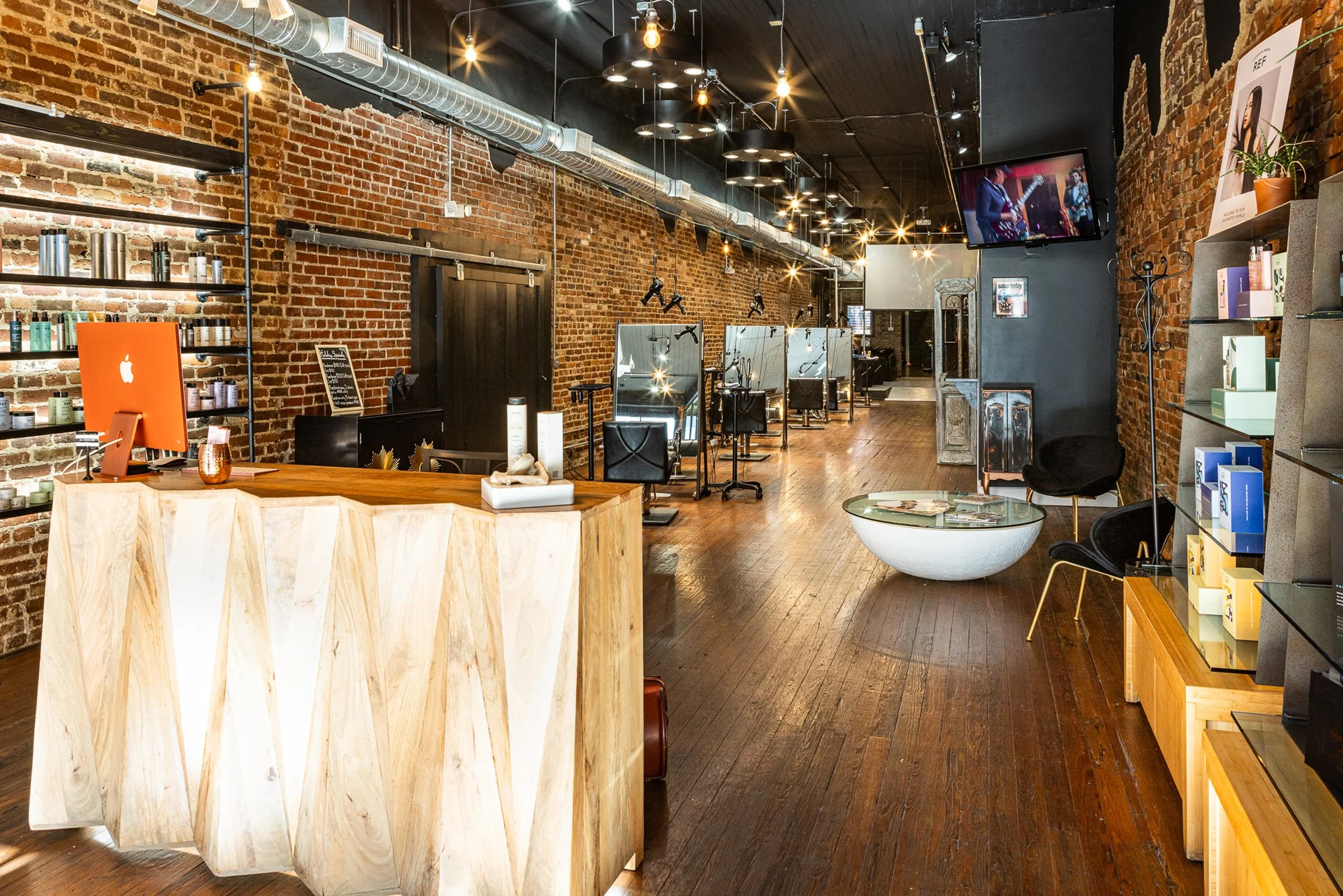 all things new salon interior with front desk and salon chairs