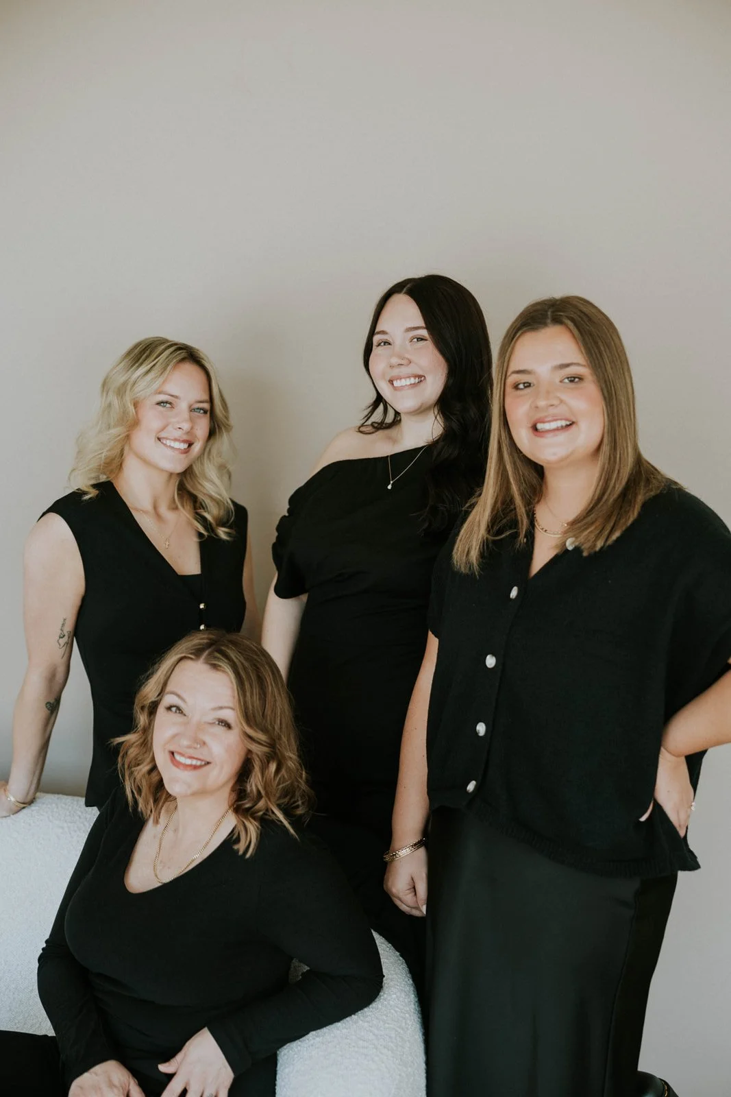group shot of the All Things New stylist team