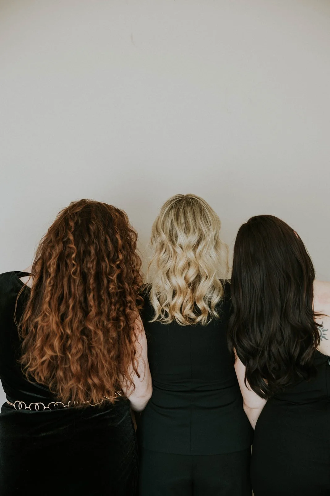 trio of three women with red, blonde, and brunette custom hair color