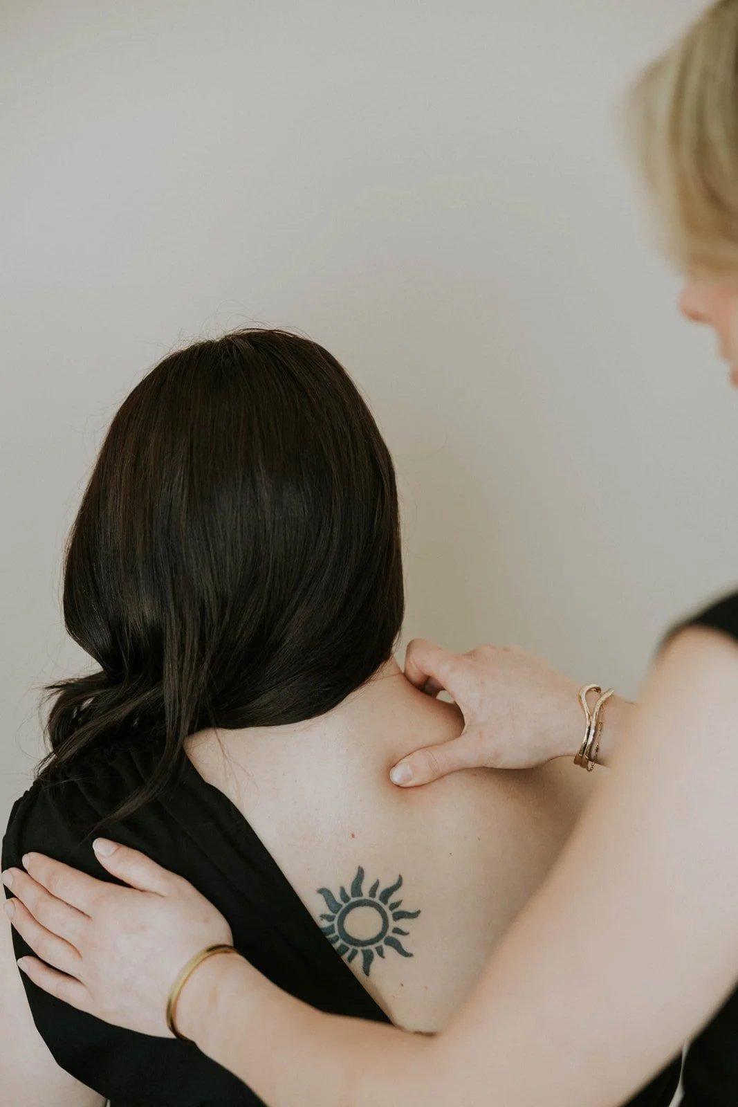client receiving a neck massage