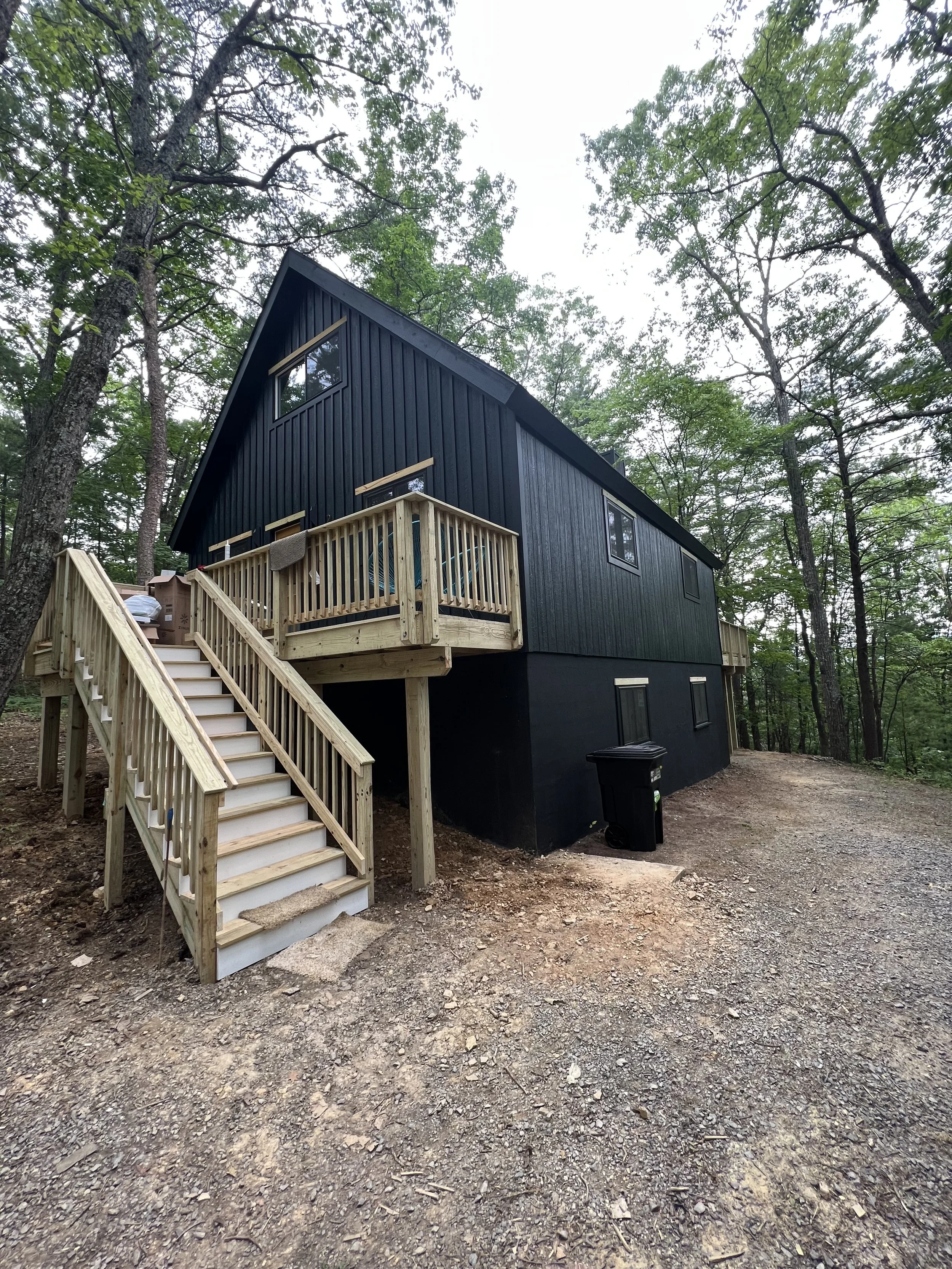 Oranssi technician working on a roof project