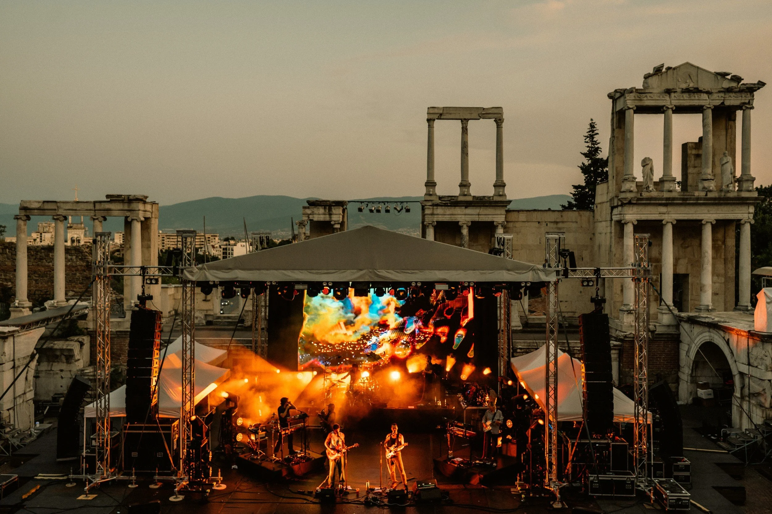 King Gizzard & The Lizard Wizard performing live at the Ancient Theatre of Philippopolis in Plovdiv, Bulgaria lit by Terence Ankeny lighting designer - archival fine art print  by Photon Obscura