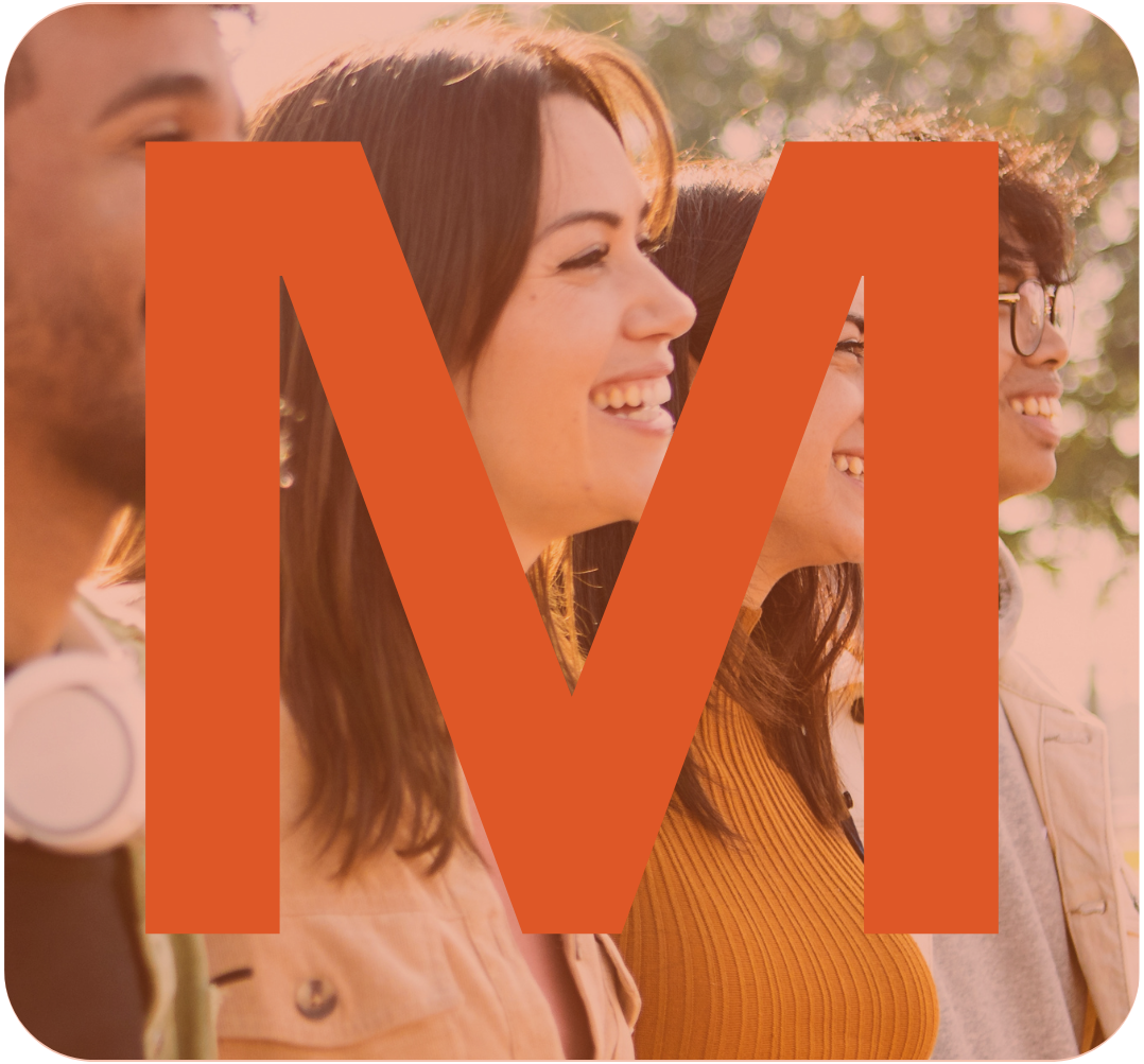 Four diverse young adults smiling and looking forward outdoors with sunlight and trees in the background, with a large orange letter 'M' overlaying the image.