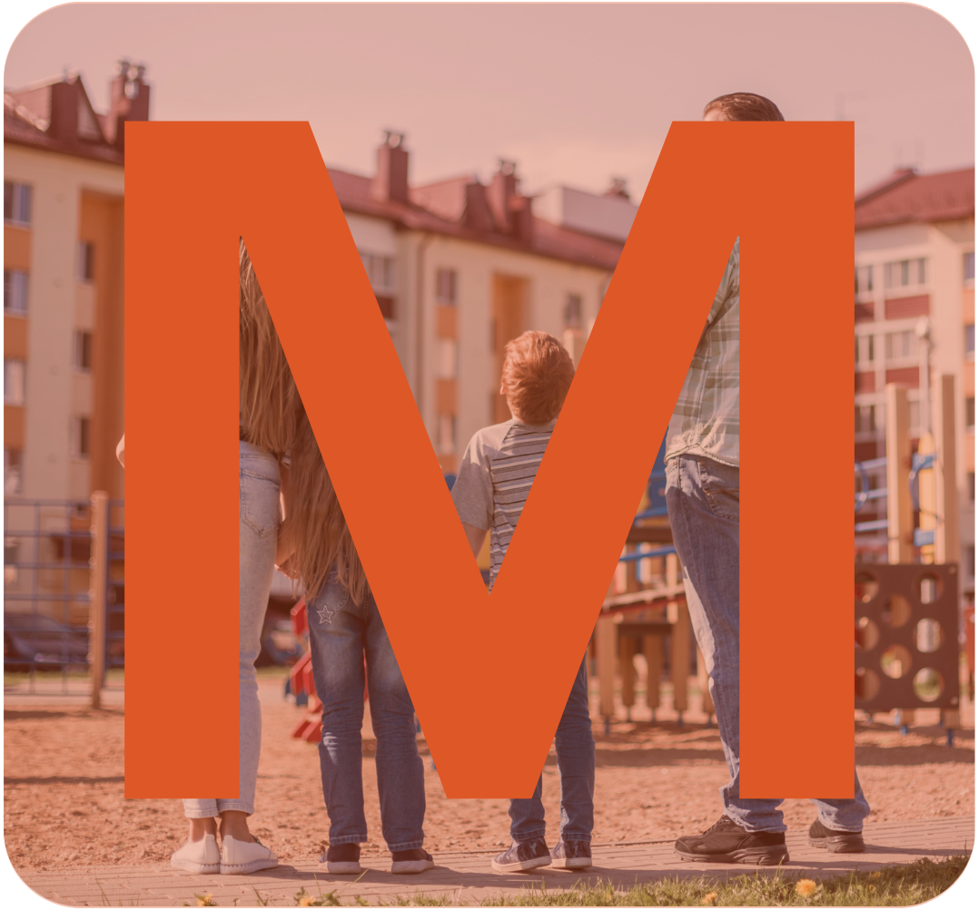 Children playing outdoors in a playground area during daytime.