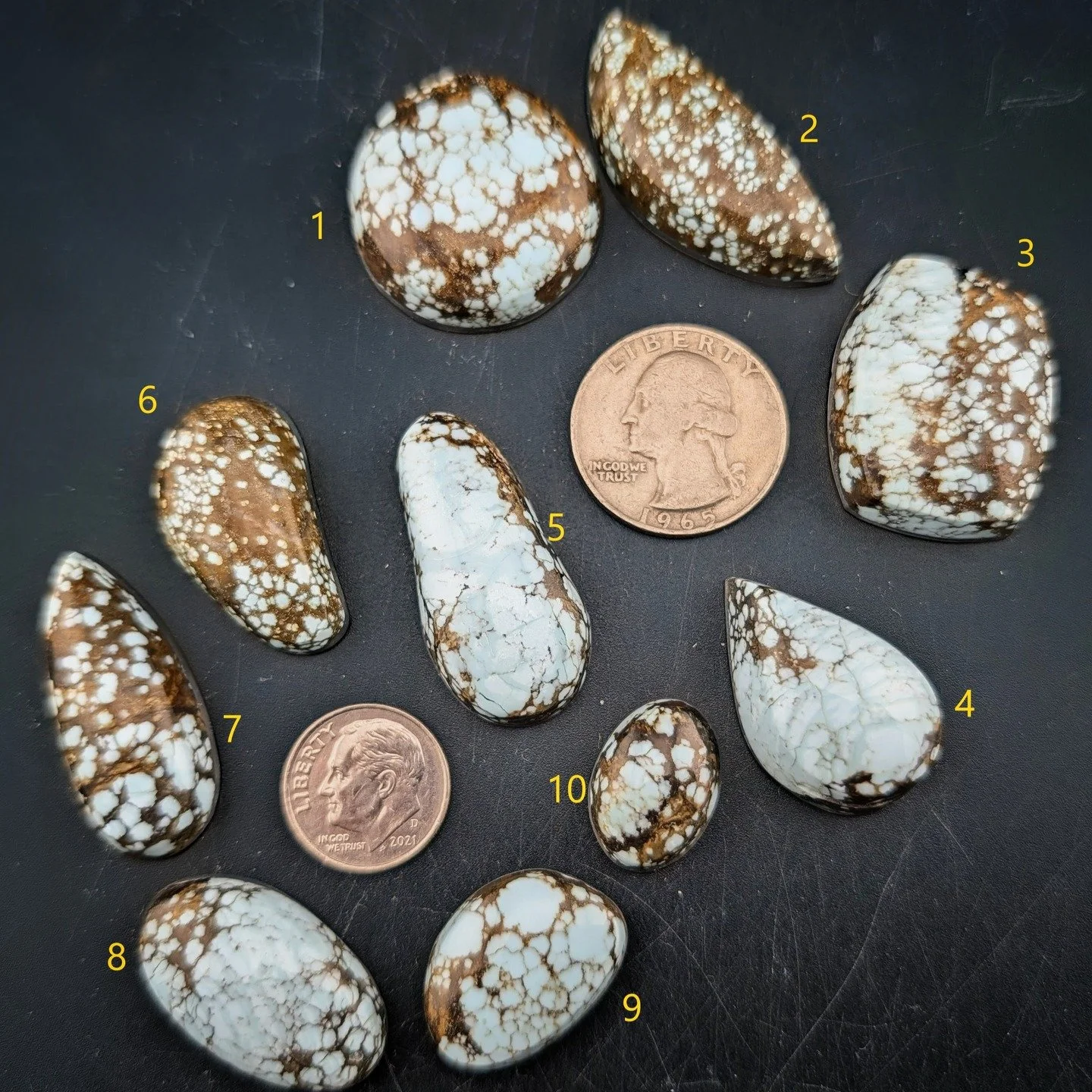 Blue Moon Spiderweb Turquois from Tonopah, NV. Bigger cabs with beautiful blue turquoise and a nice dark chocolate matrix.

Number 1 - 45 carets at $90
Number 2 - 38 carets at $76
Number 3 - 38 carets at $76
Number 4 - 28 carets at $56
Number 5 - 27 