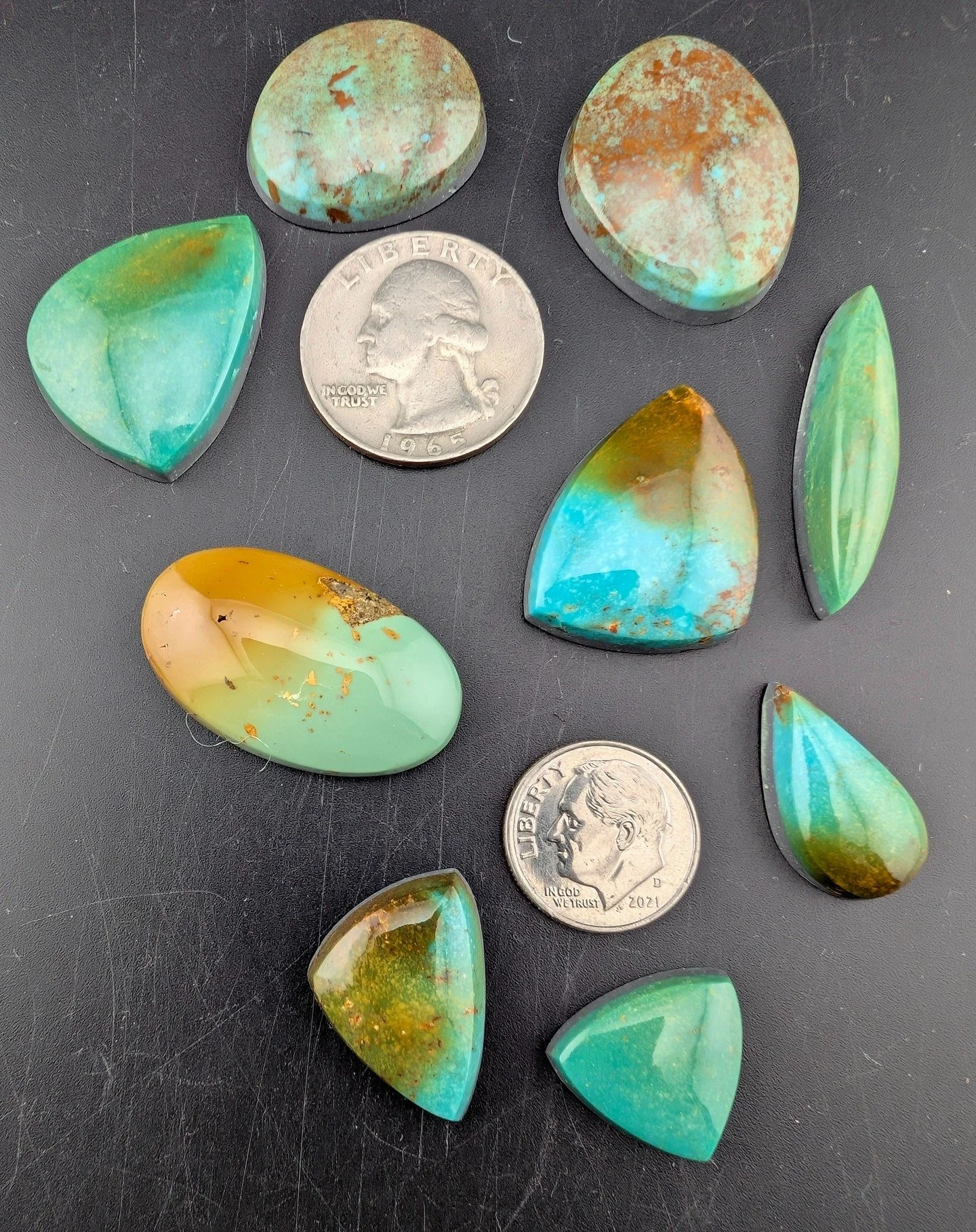 Turquoise from the mine at Tyrone, NM. Look carefully at the green color in these stones. It is almost a mystical green.

#turquoise #turquoiseforsale #turquoisecabs #lapidary #cabochon #cabochons #stonesale #cabsforsale #cabochonsale #paradiselapida