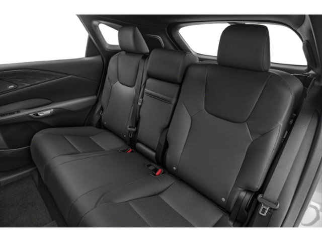 Backseat interior of a Lexus SUV with black leather seats, three headrests, and seat belts.