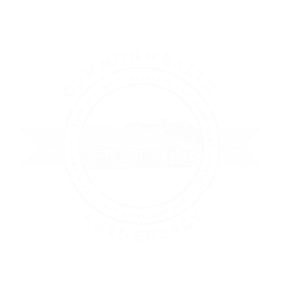 Logo for Commonwealth Agrip Energy featuring a circular design with a landscape of mountains, a water tower, and a building, with text around and within the circle indicating its focus on fuel ethanol, beverage, and industrial ethanol production.