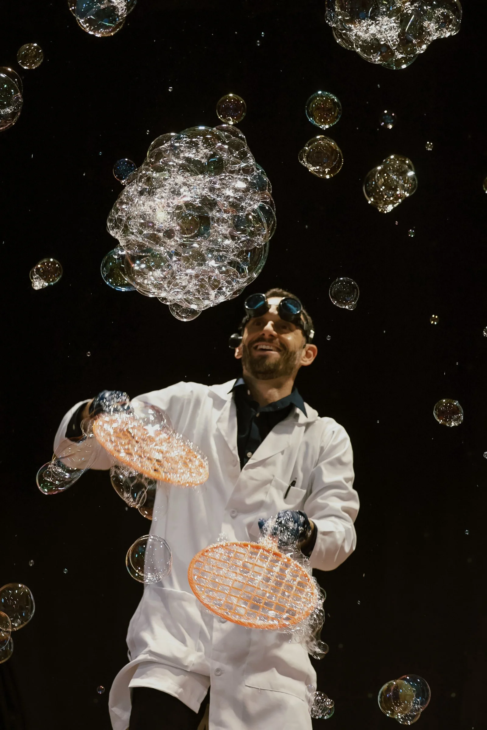 Kids enjoying an interactive bubble show at a birthday party in Colorado Springs