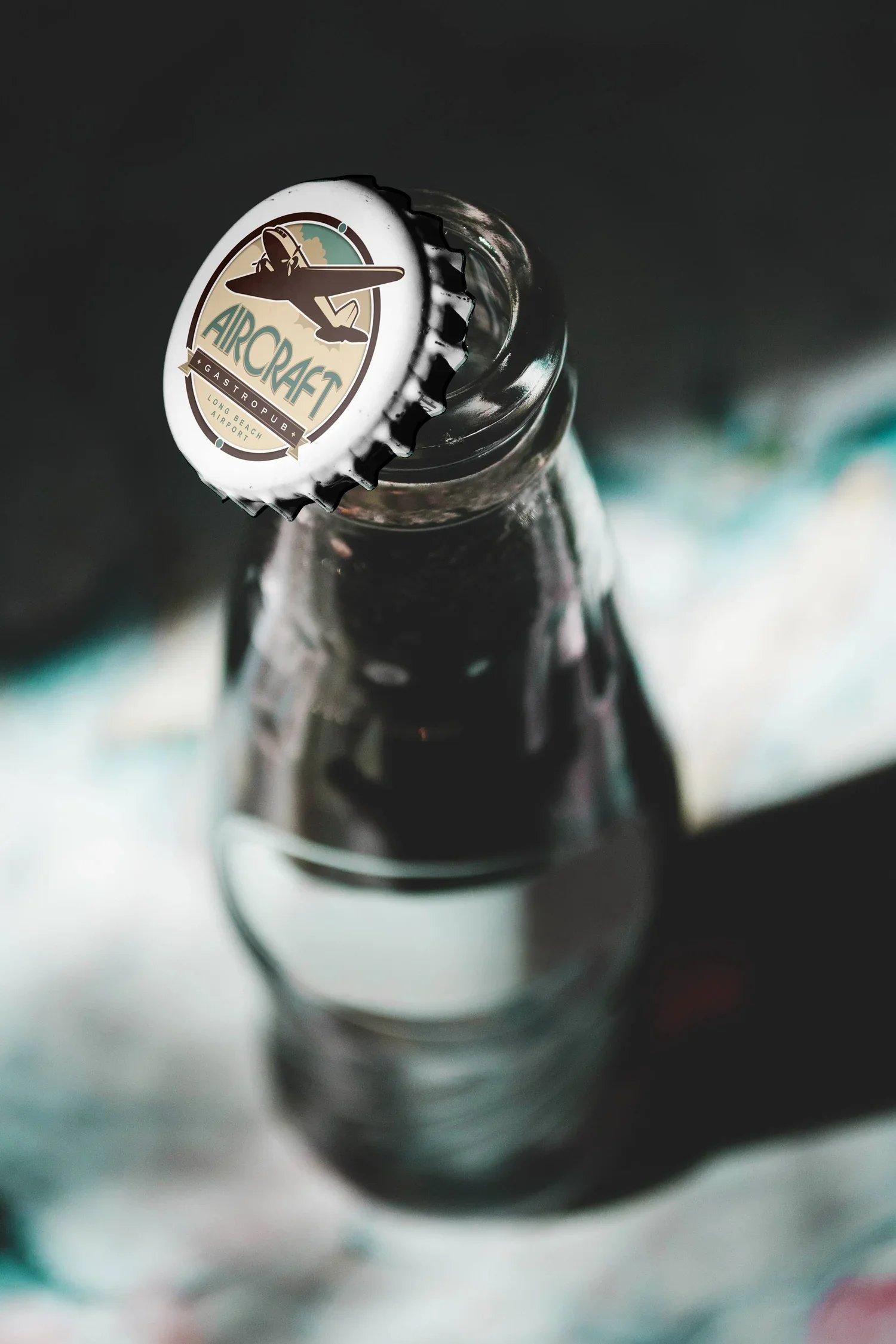 AirplaneGastropub_Bottle&Cap_Mockup.jpg.webp