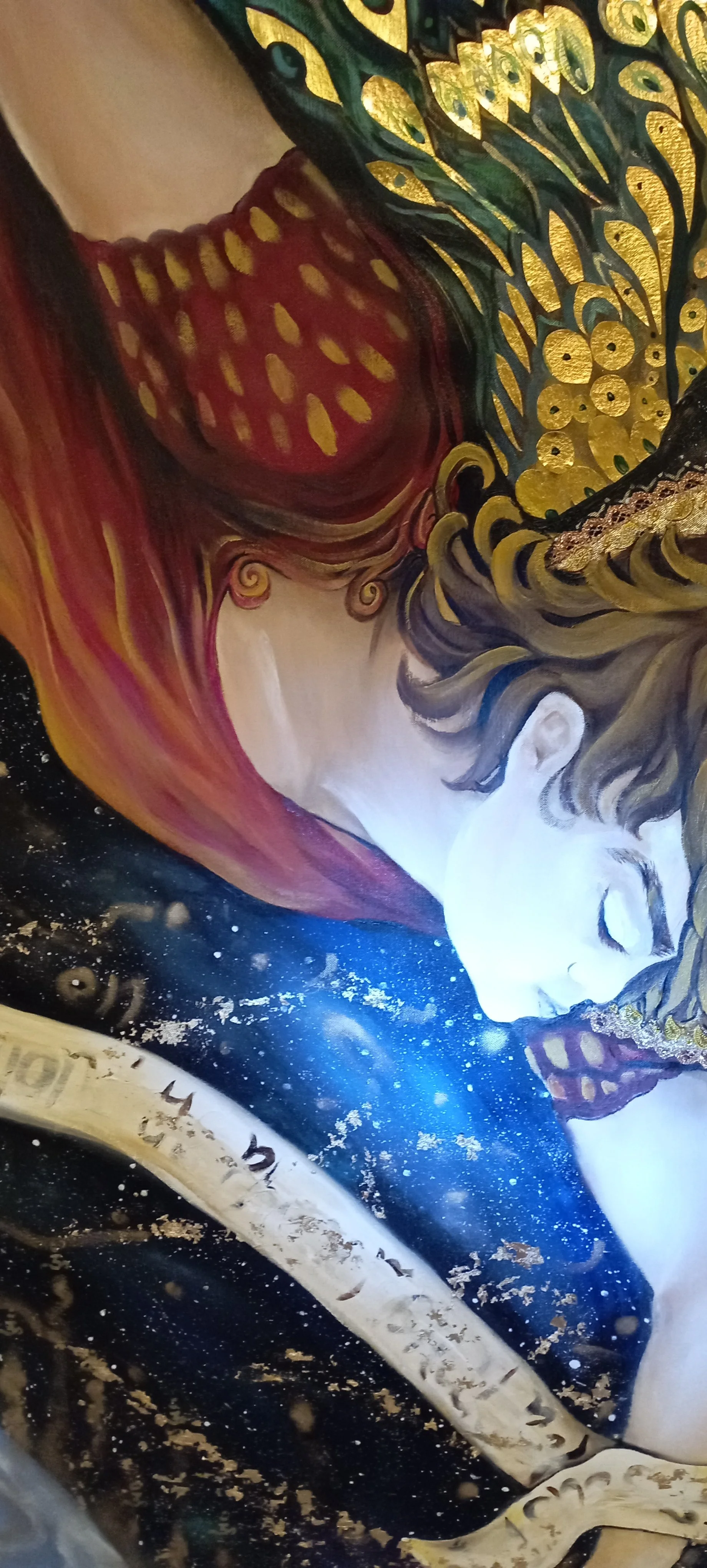 A detailed, artistic depiction of a person with closed eyes, long flowing hair, and a peaceful expression, set against a cosmic background with stars. The artwork features gold accents and vibrant colors.