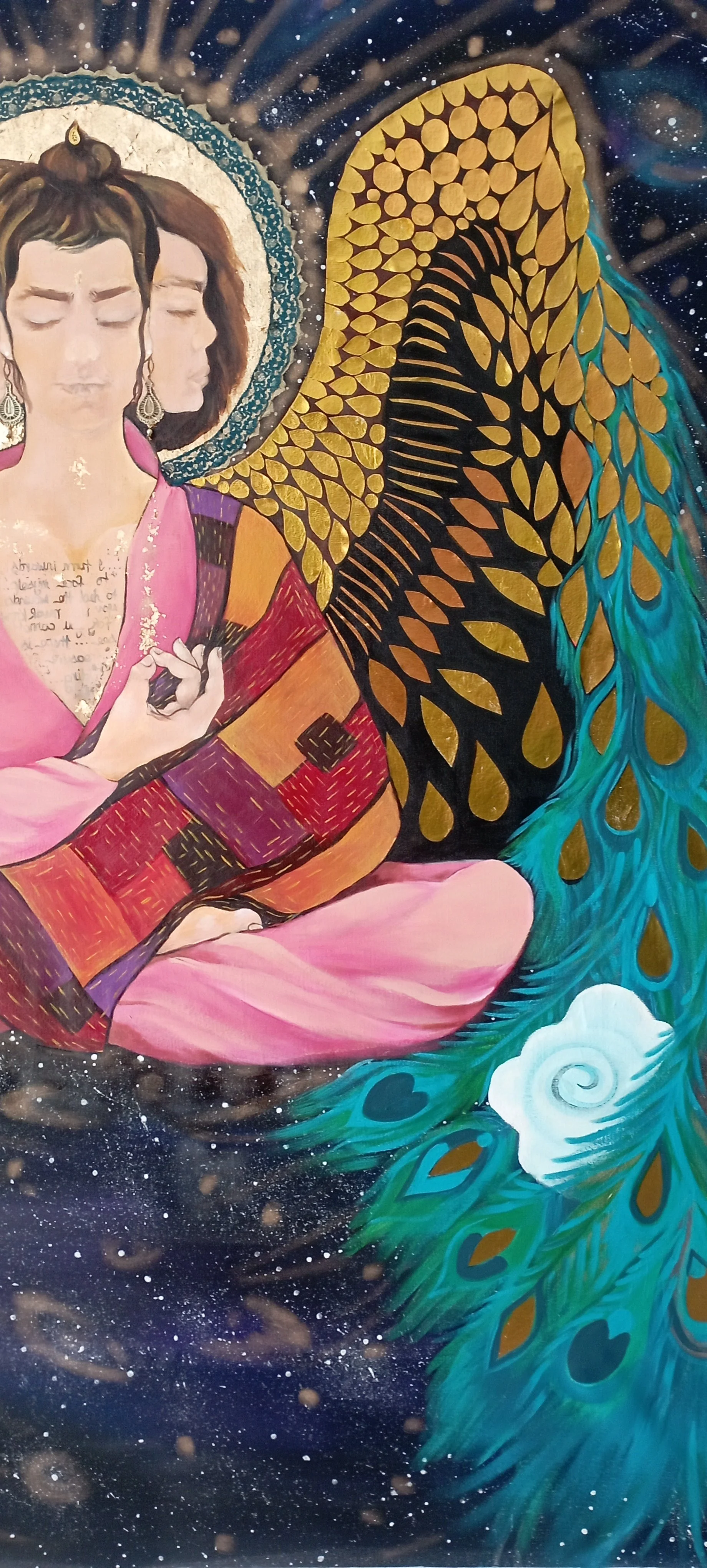A colorful painting of a woman with multiple profiles, sitting cross-legged, surrounded by a dark, starry background. She has a halo, and features vibrant peacock feathers extending from her back.