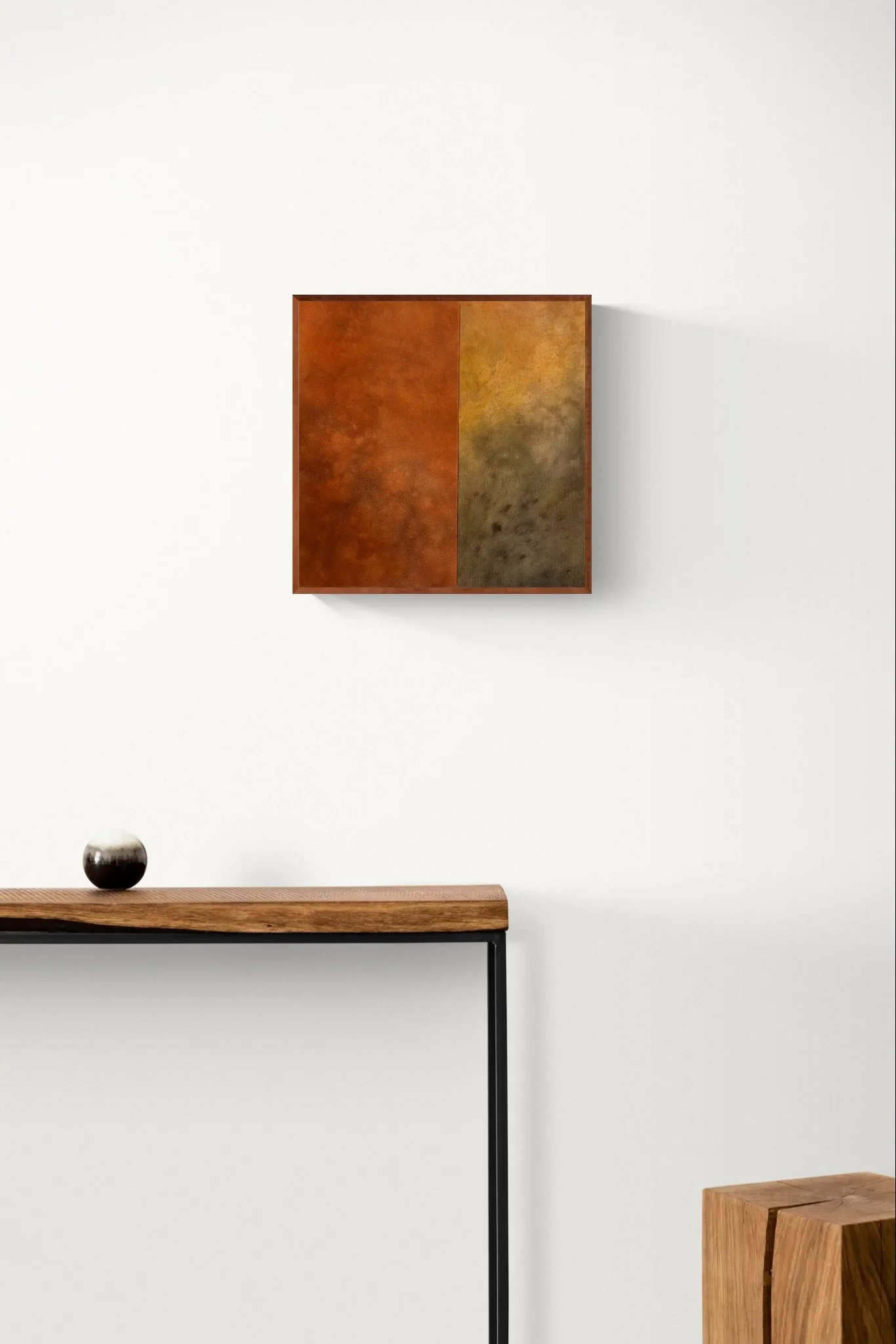 Console table and solid wood pedestal in hallway.jpeg