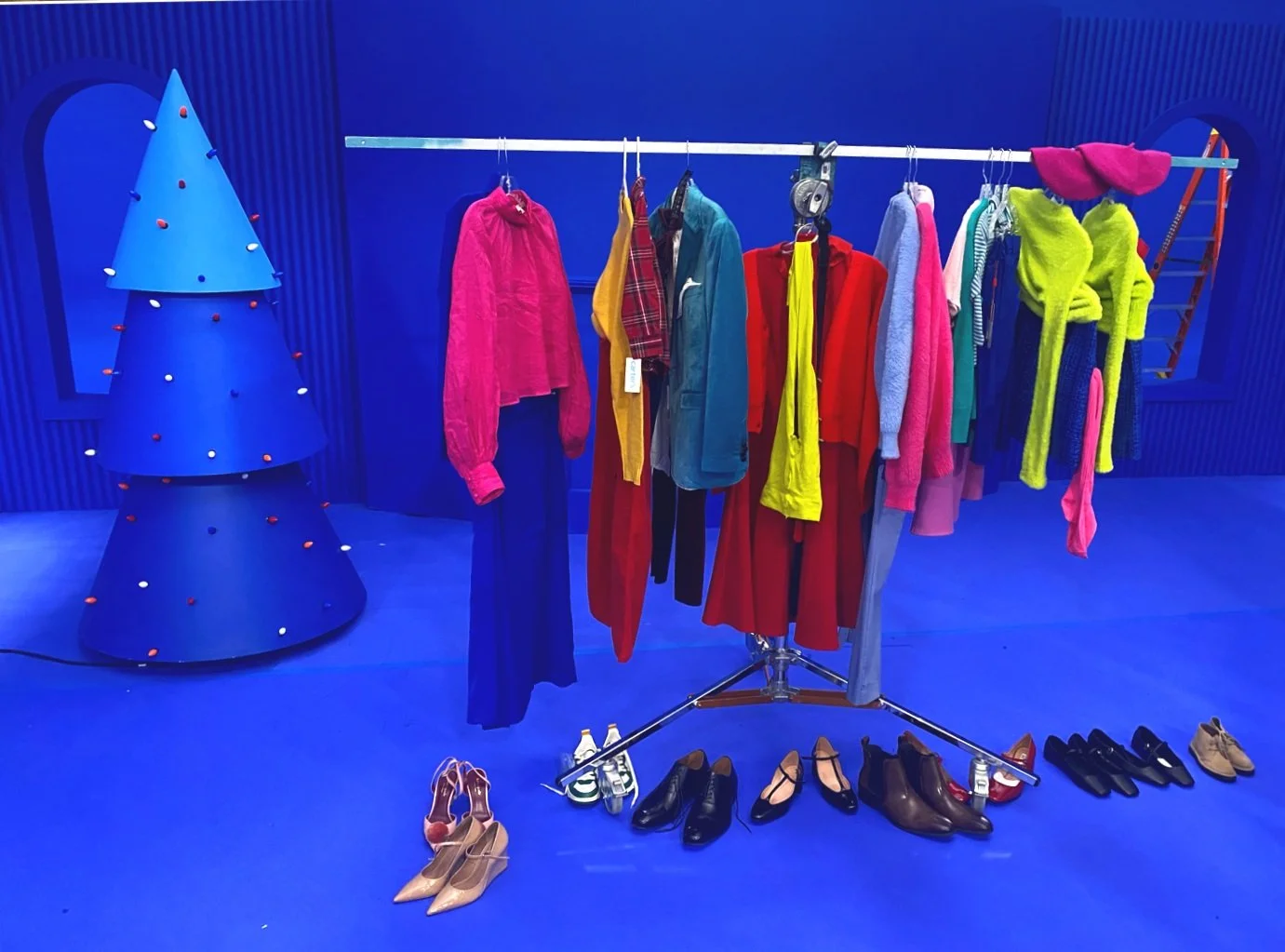 WARDROBE:
Wardrobe was full of bright and punchy colors that worked as accents on our blue set.