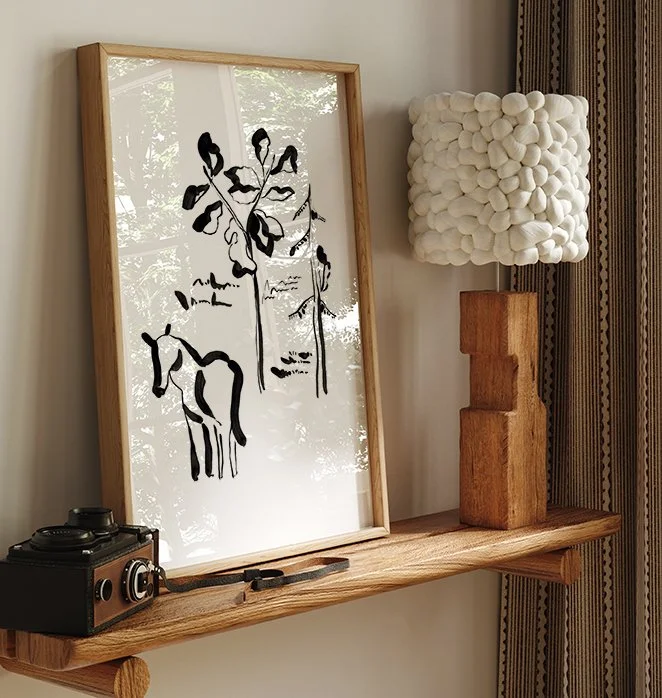 Horse ink illustration framed on wall