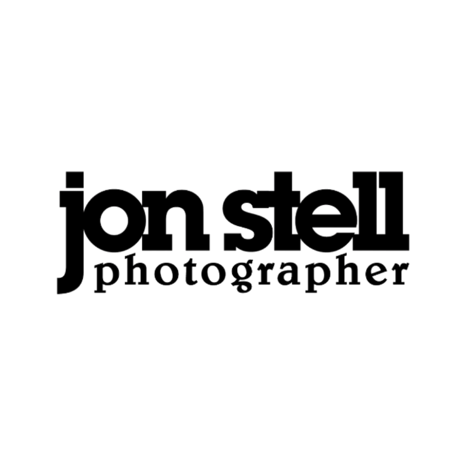 Black and white logo of Jon Stell Photography.