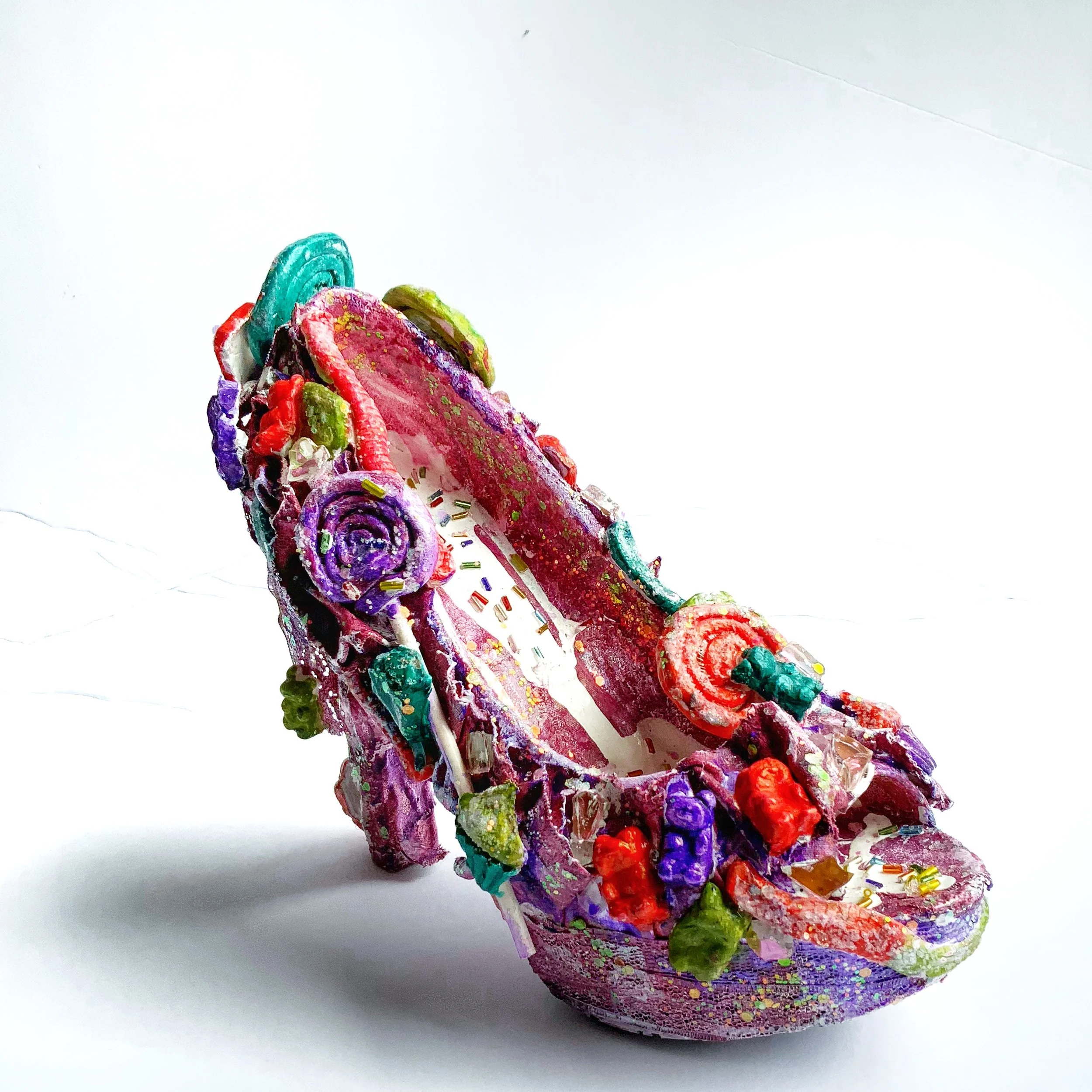 My most recent "repurposed" shoe was for Powertex Products USA where I turned a boring high heal into a SWEET Sugar Shoe. 2 Part Full Tutorial on YouTube. 