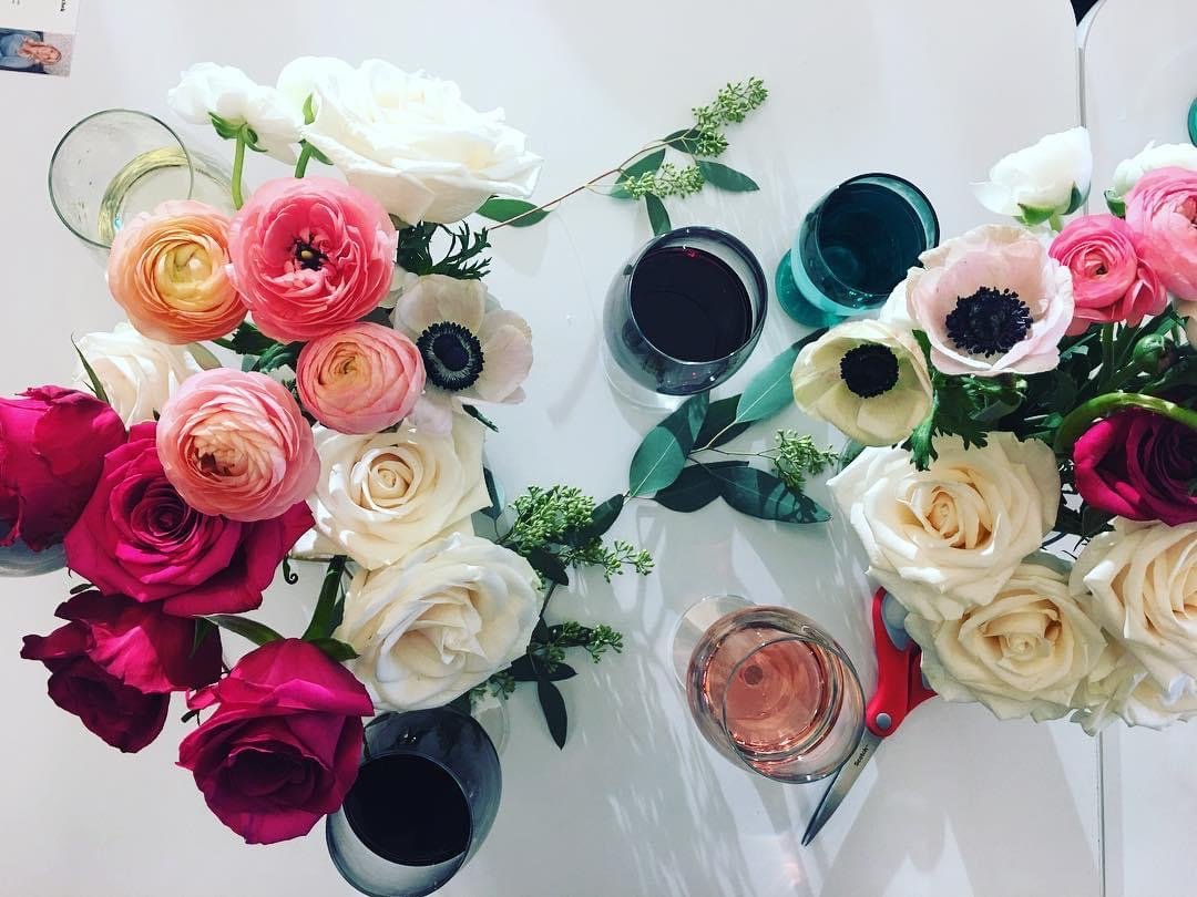 bright colorful floral arrangement from floral social event featuring peonies and anemones