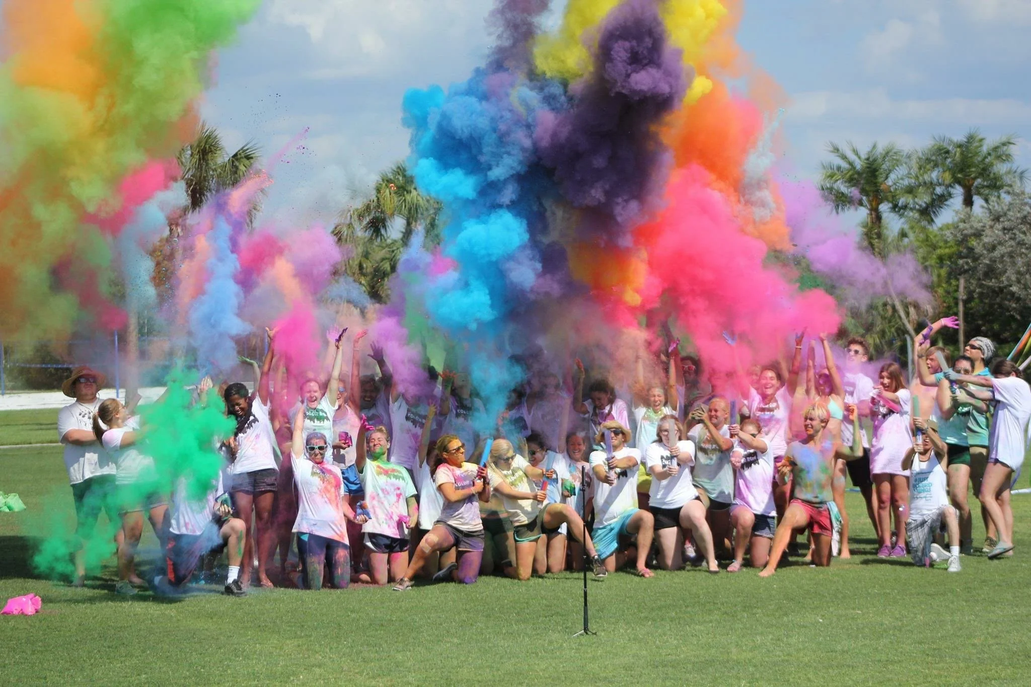 colorful burst of chalk colors following color run event on college campus