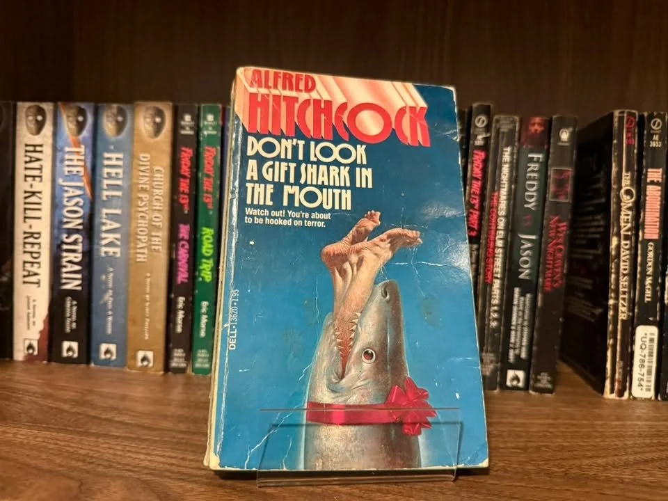 DON'T LOOK A GIFT SHARK IN THE MOUTH - ALFRED HITCHCOCK