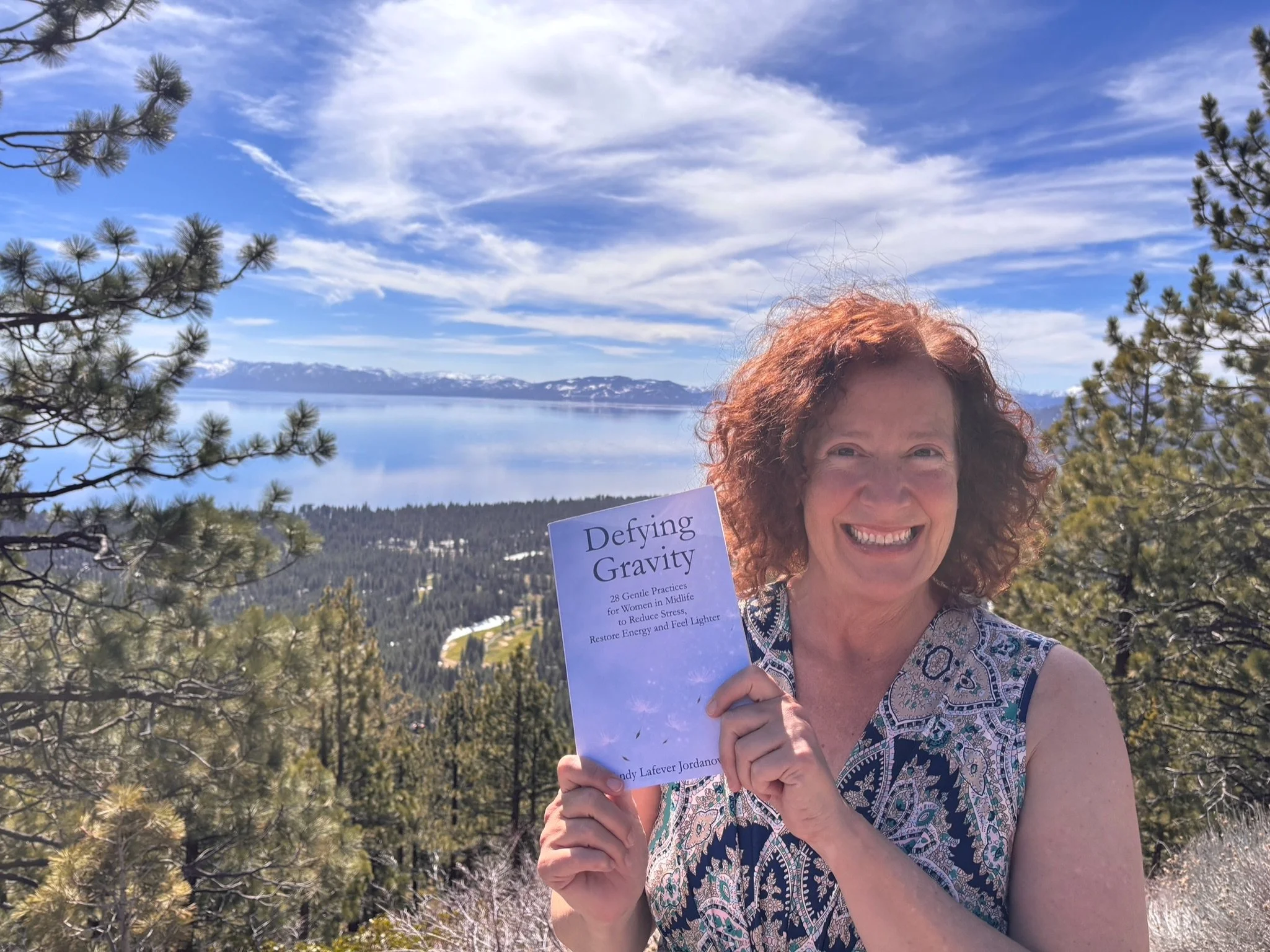 dr wendy jordanov holding her book at take tahoe