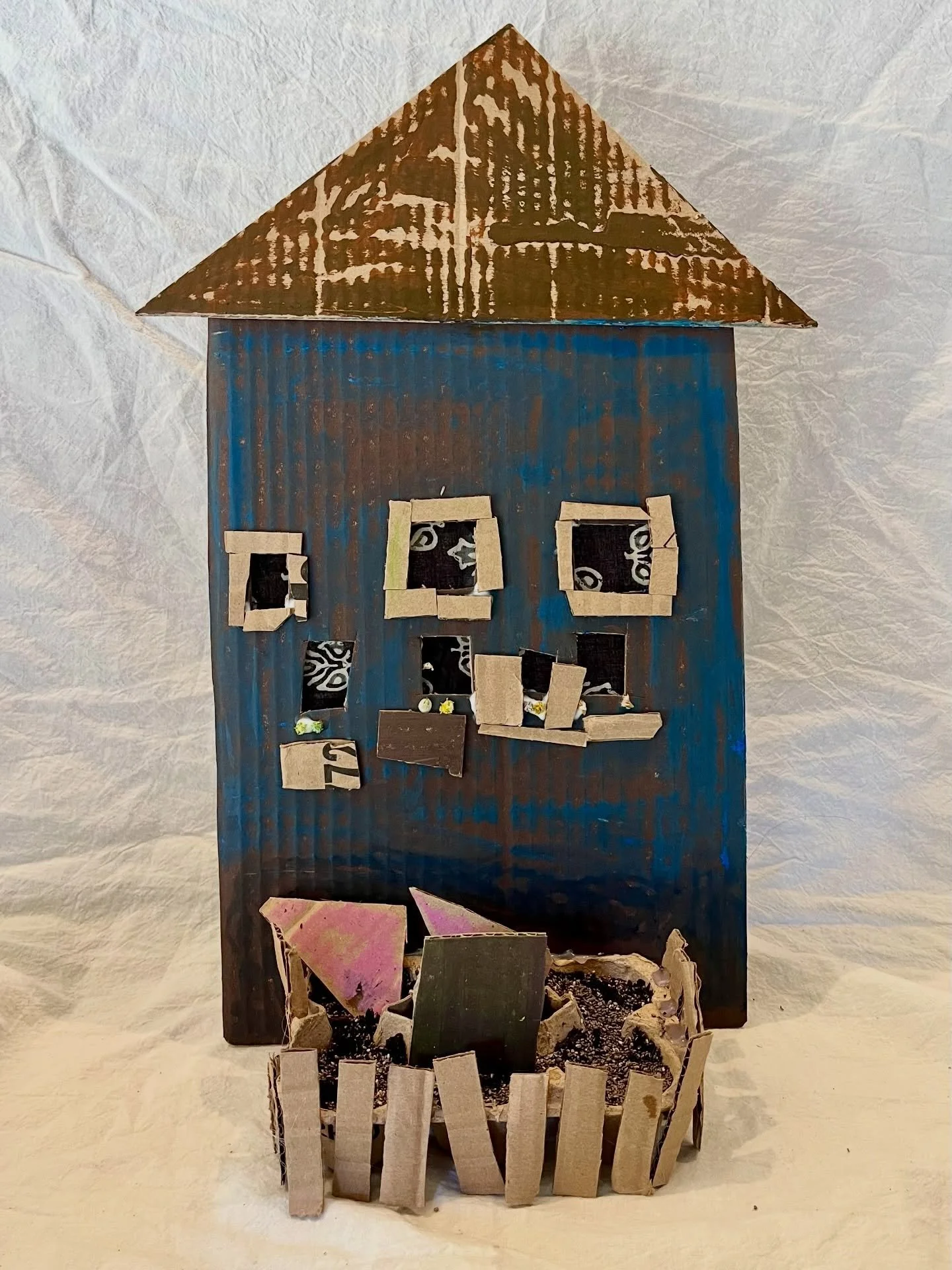 Cardboard houses with chia seed gardens. Did they sprout? No! But it was fun to try!