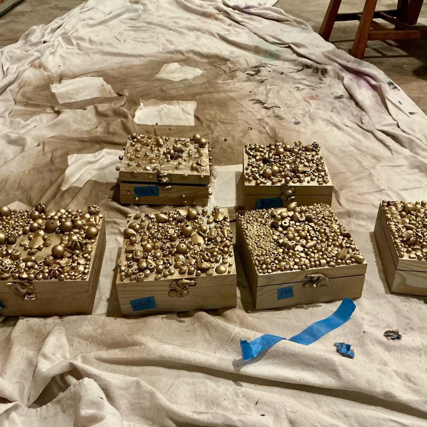 Antique treasure boxes. craft glue, beads by the scoop, spray paint, lined with deadstock velour and a beveled mirror.