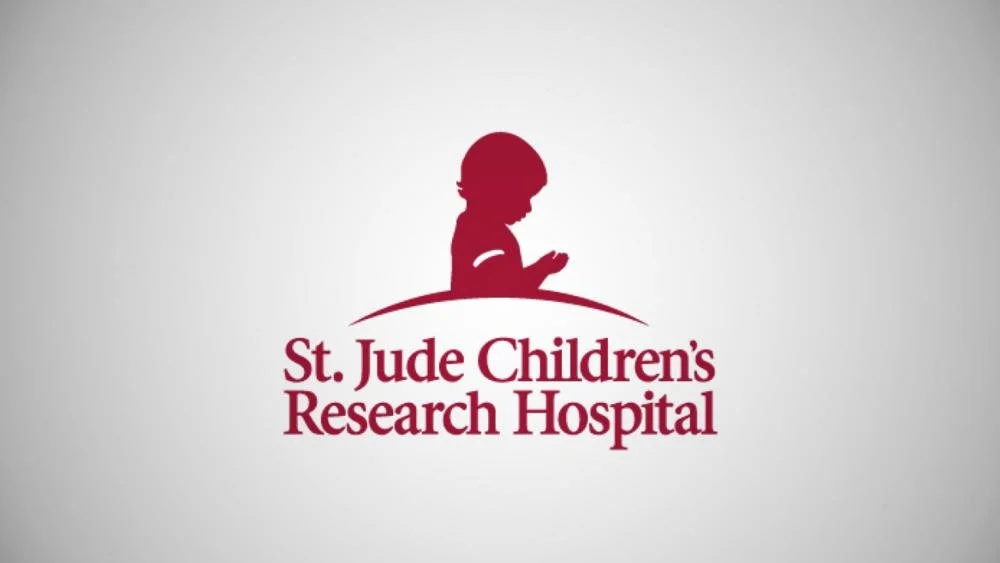 Logo of St. Jude Children's Research Hospital featuring a silhouette of a child looking down and holding their hand, with the hospital's name beneath.