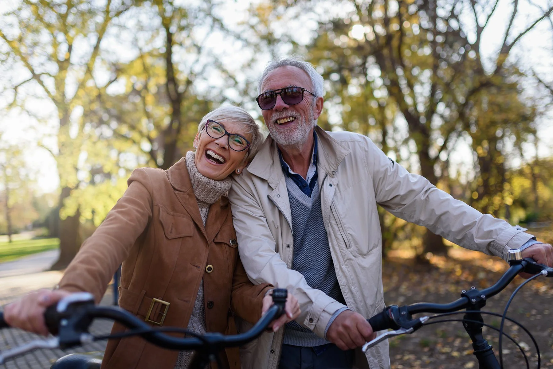 Husband and wife enjoying an outdoor hike, the husband has Parkinson's disease and has improved communication after speech therapy for adults in Edmond, OK