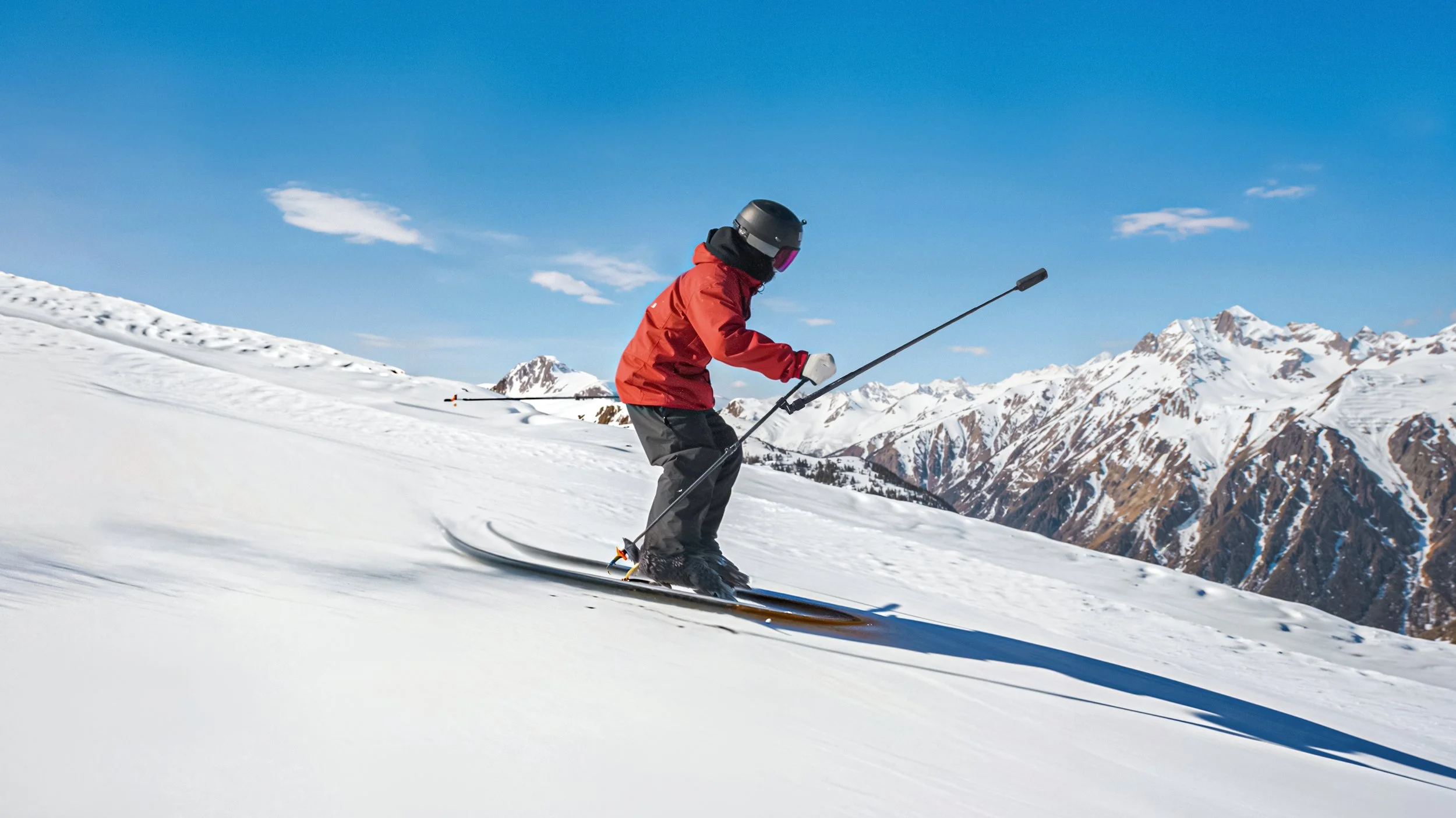 skiing with Insta360 X5 in front of him mounted on his pole