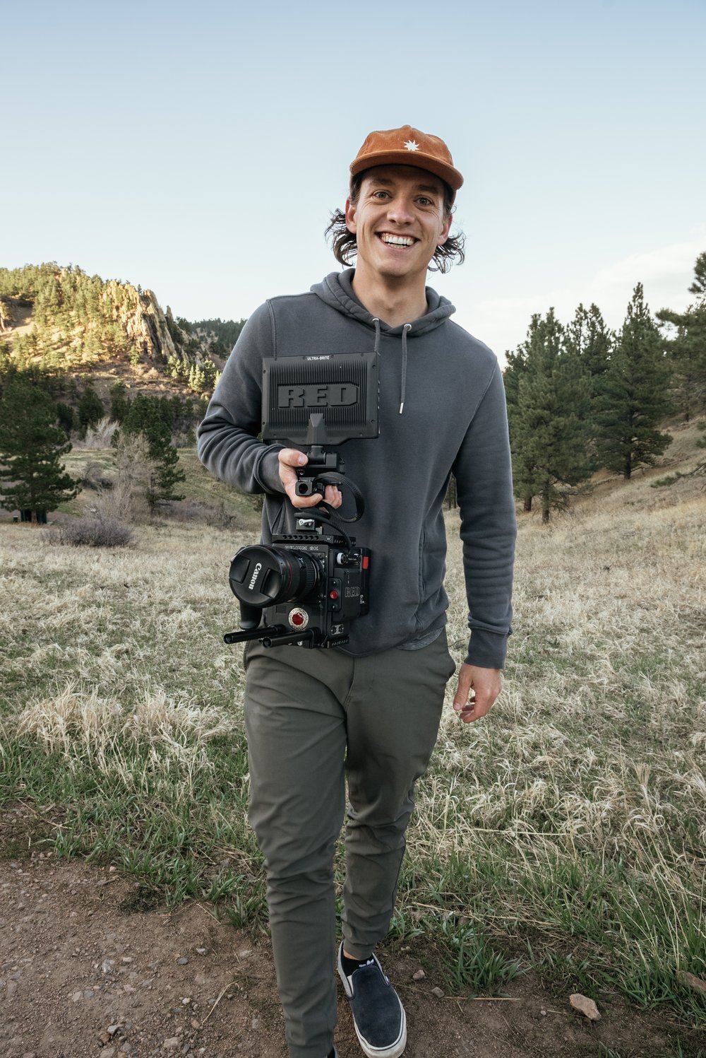 Roo holding a RED camera in Boulder, Colorado